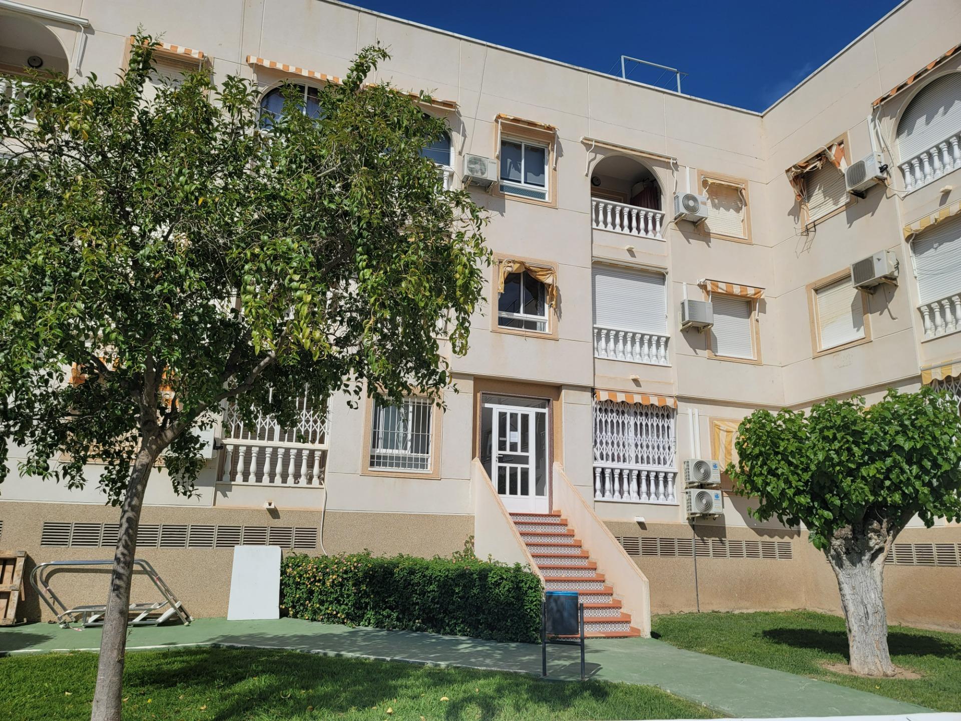 Street-level view adjacent to residential complex, Acequion, Torrevieja