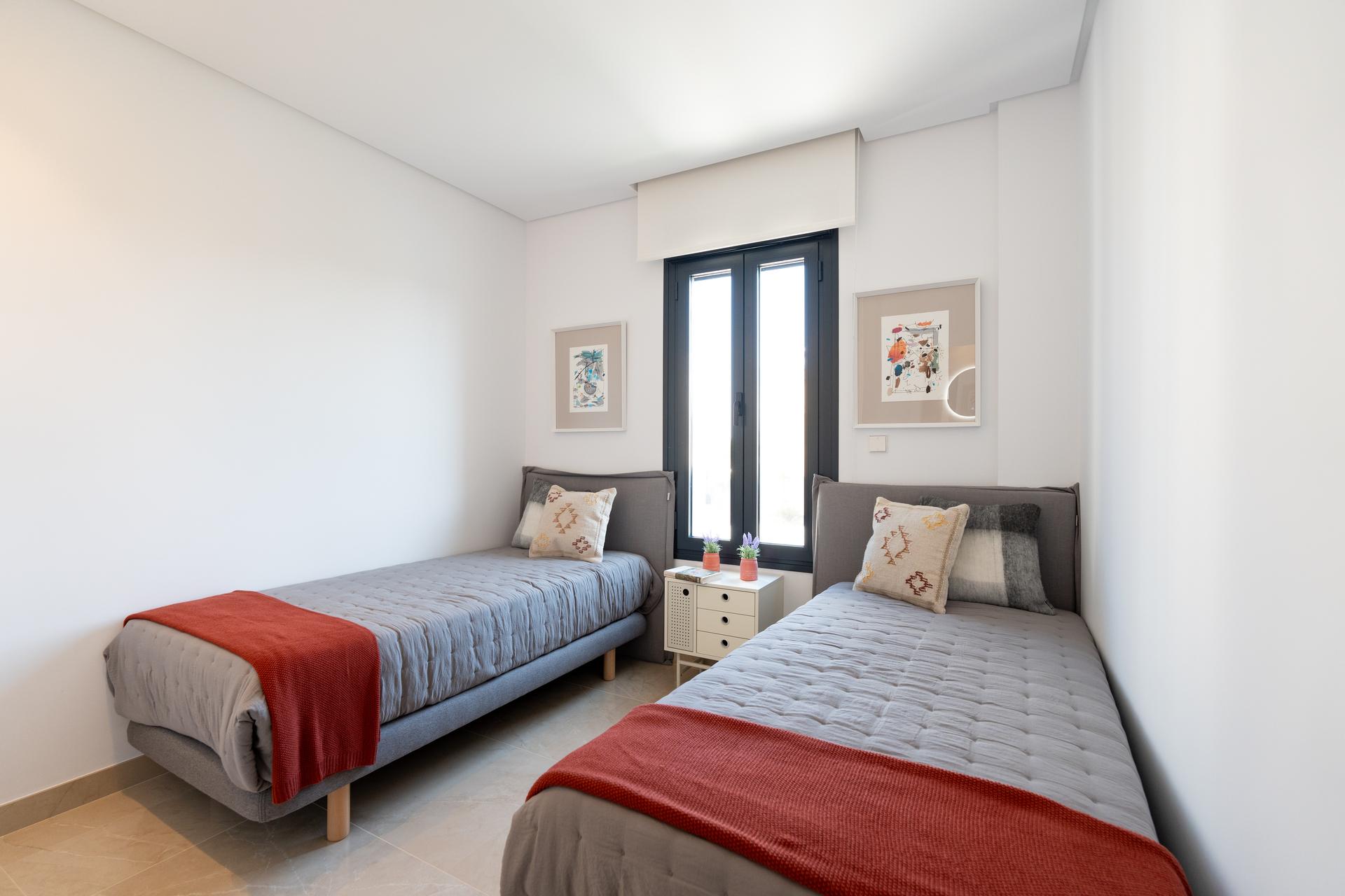 Communal pool area with surrounding terrace, residential development, El Pinet