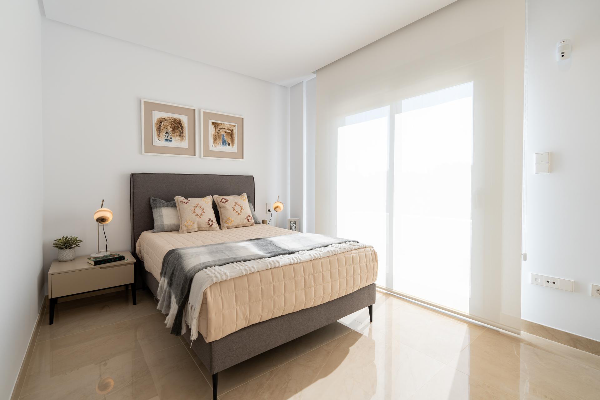 Second bedroom with window and built-in storage in 3-bedroom townhouse, El Pinet