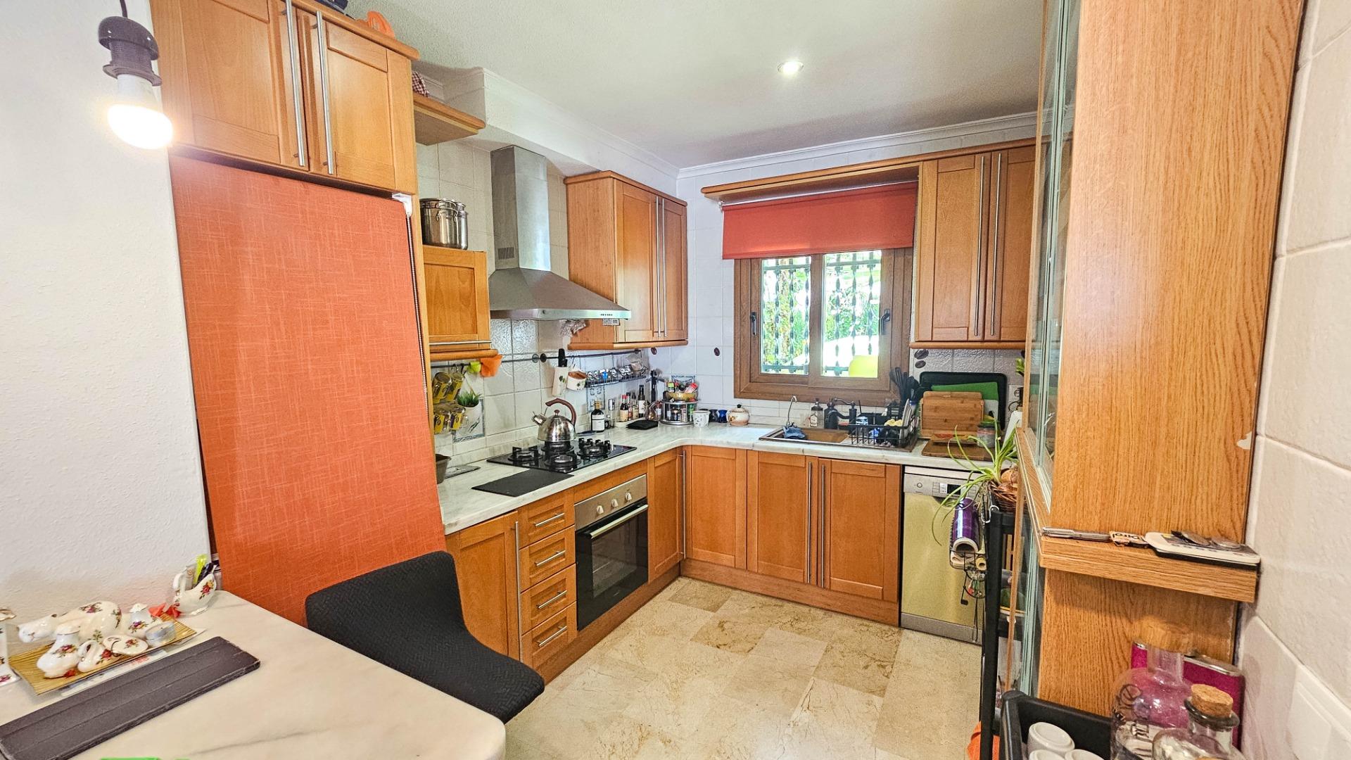 Ground-floor shower room with tiled walls in 1-bedroom townhouse, PAU 8