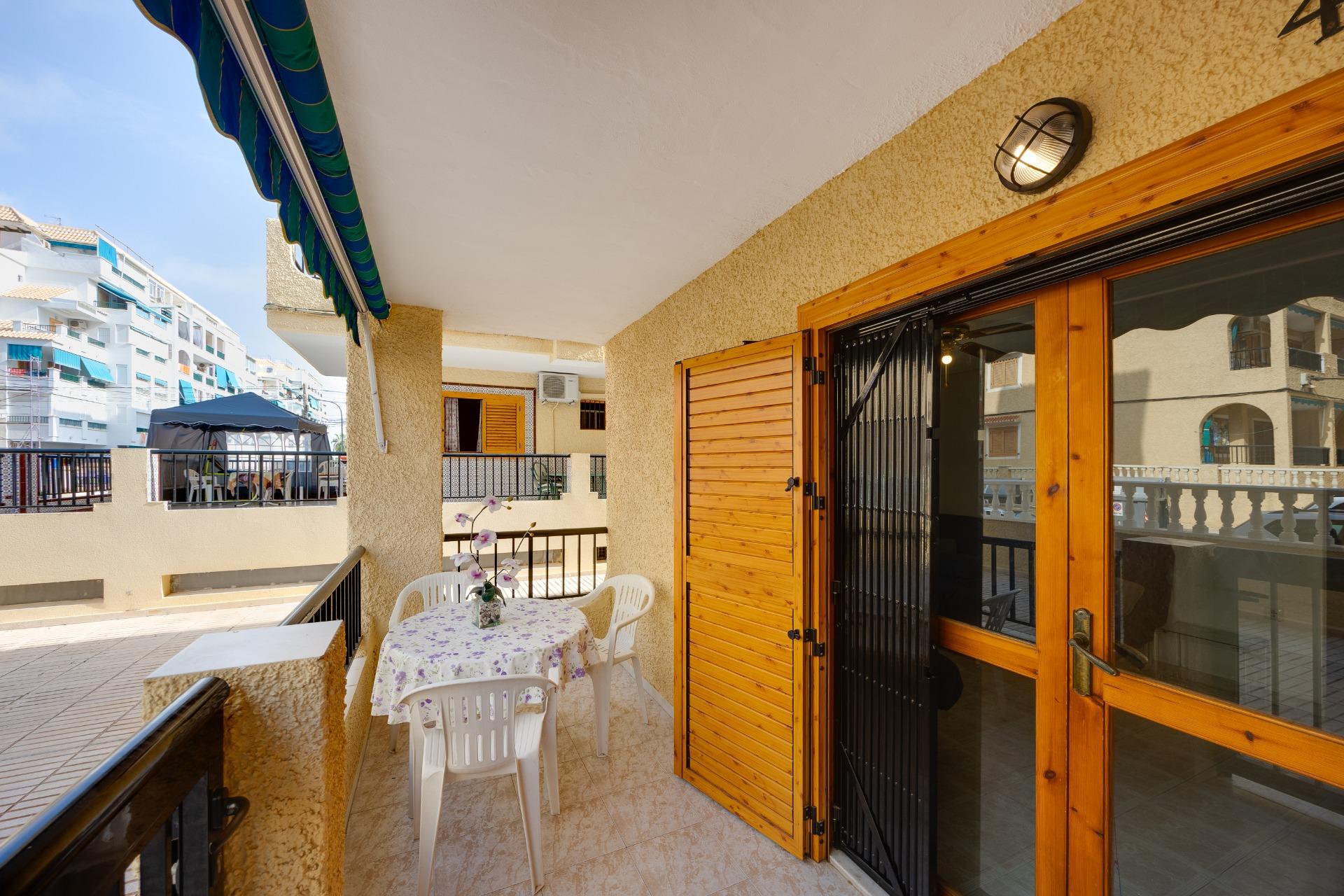 Kitchen worktop and units in open-plan living area, La Mata apartment