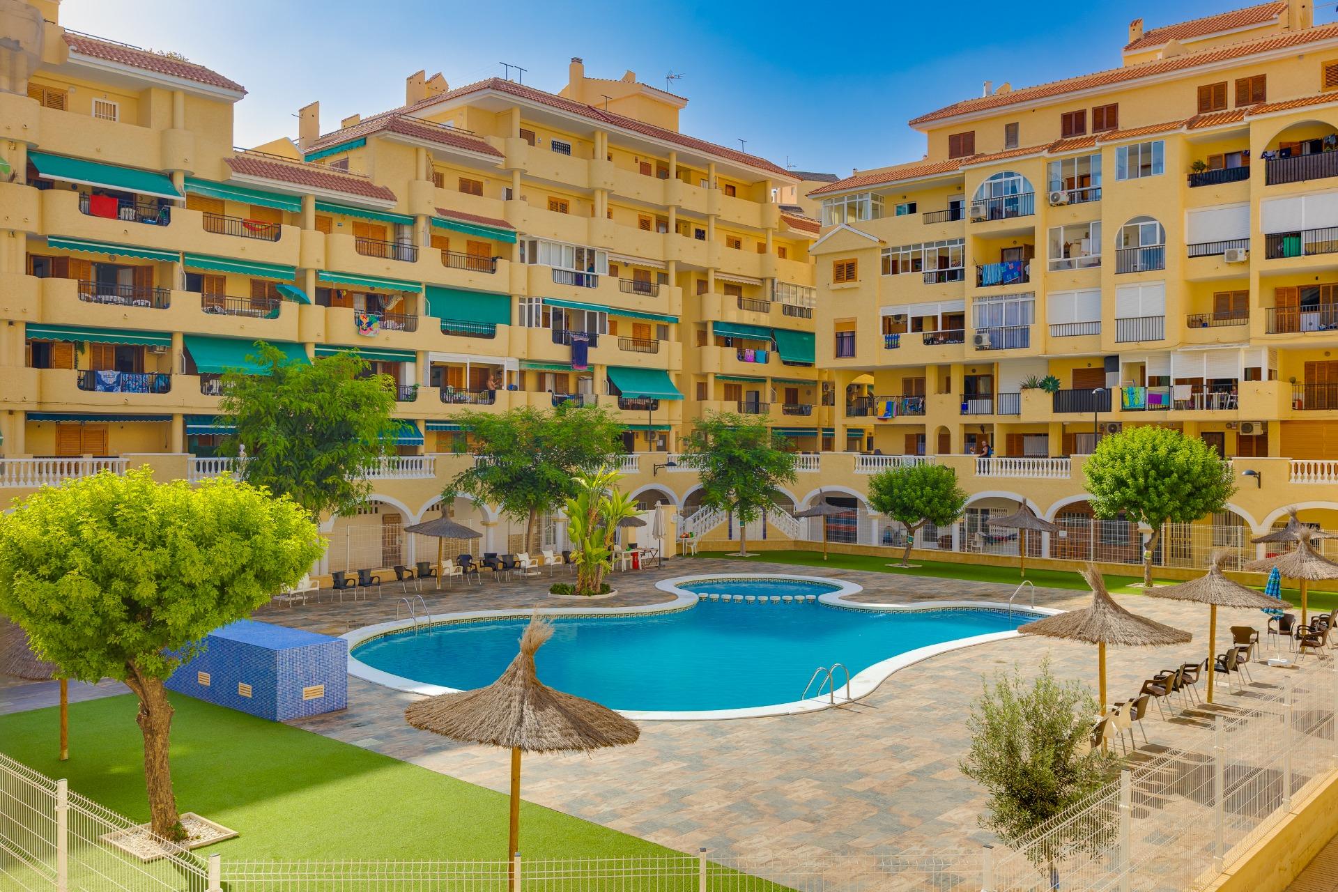 Residential complex exterior with communal landscaping, La Mata, Torrevieja