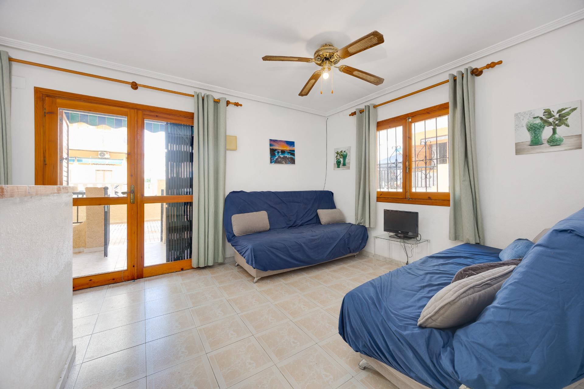 Open-plan kitchen and living room in ground-floor apartment, La Mata, Torrevieja