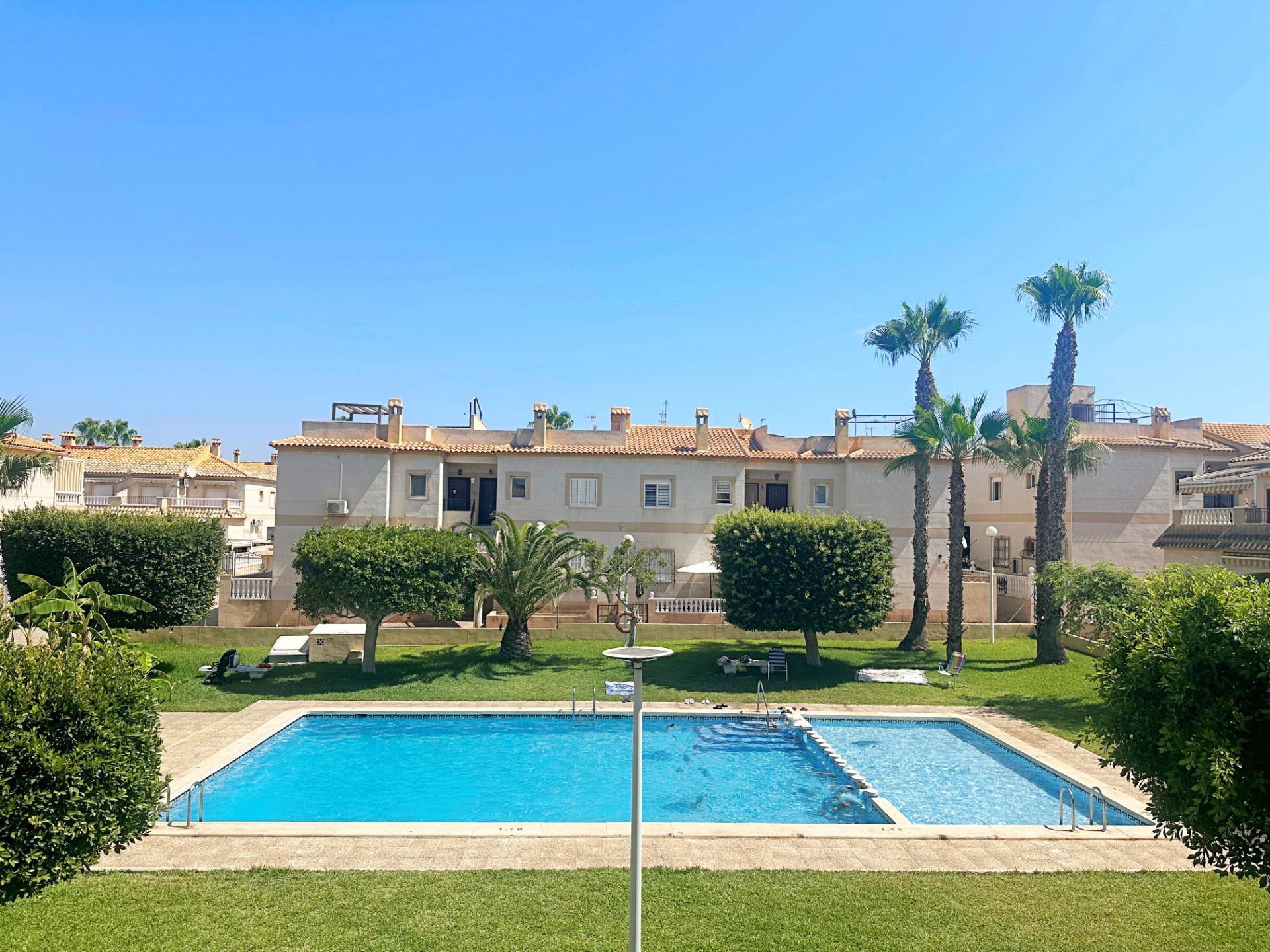 Street-level exterior view of bungalow complex, Aguas Nuevas, Torrevieja