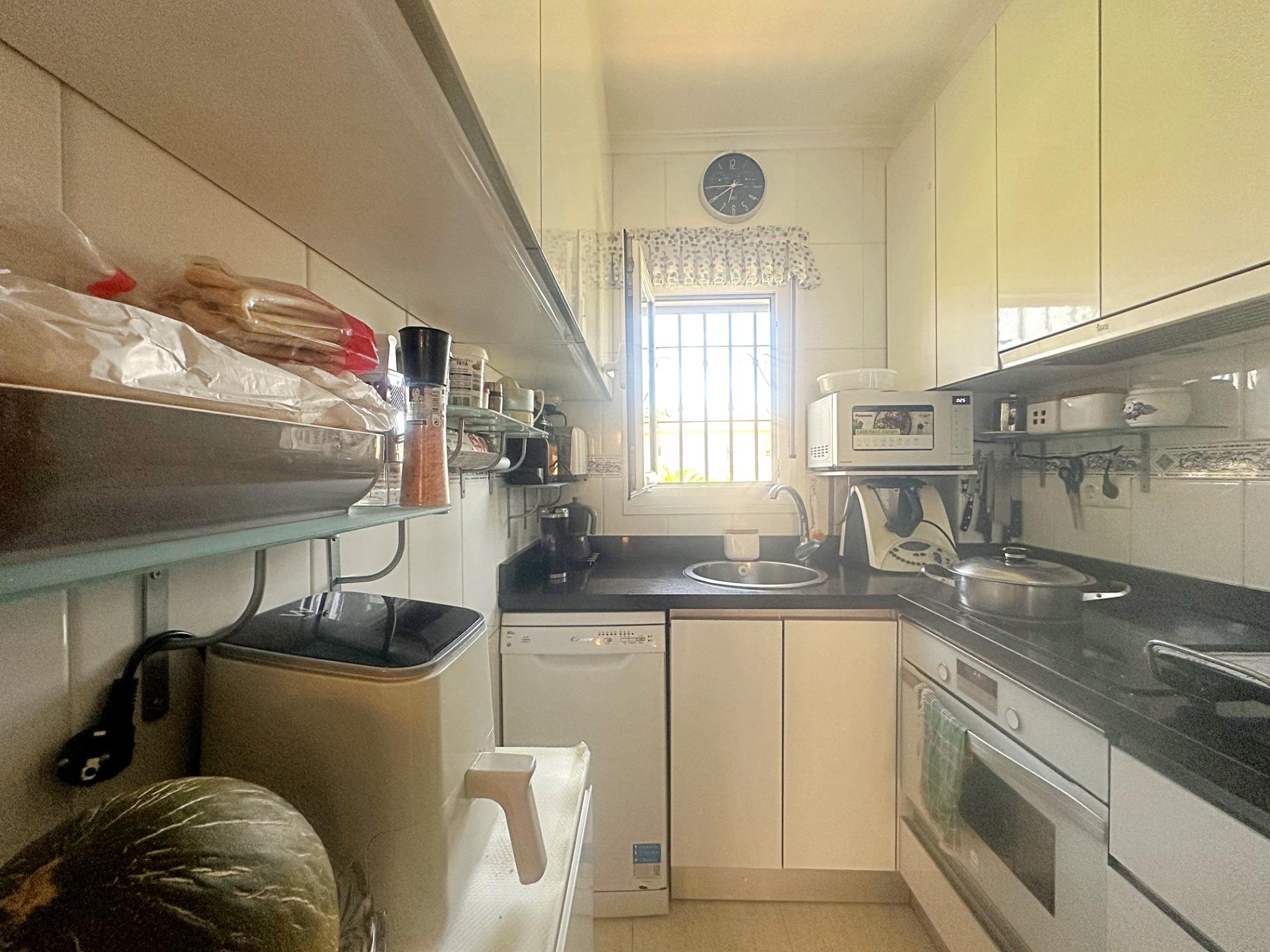 Enclosed terrace with outdoor seating in 2-bedroom bungalow, Aguas Nuevas