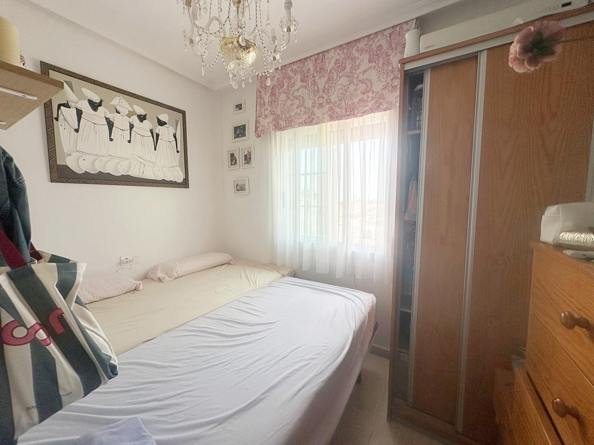 Bedroom window overlooking communal pool in 2-bedroom bungalow, Aguas Nuevas