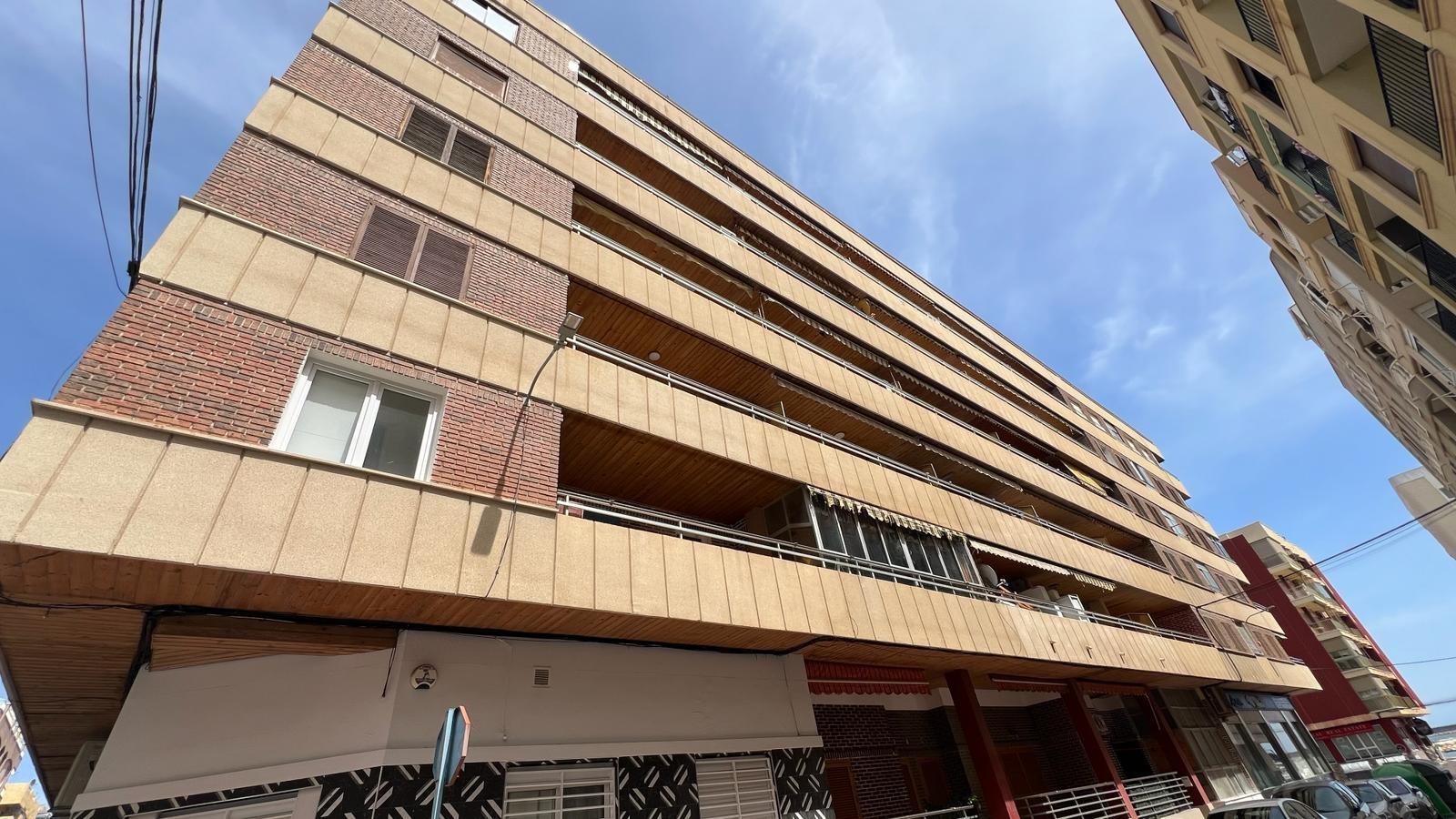 Street-level exterior of apartment building in Acequion, Torrevieja