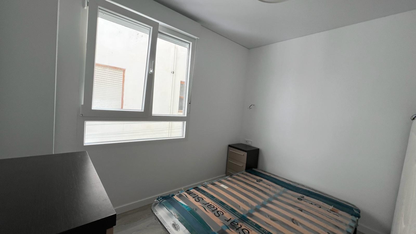 Main bedroom with built-in wardrobes in renovated apartment, Acequion, Torrevieja