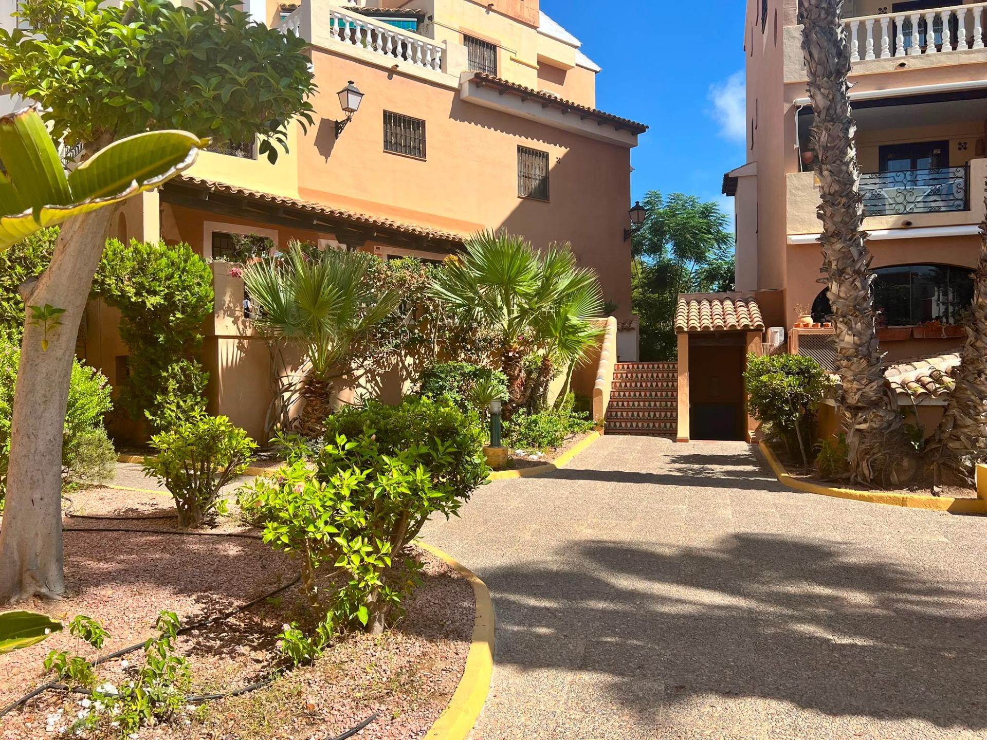 Interior corridor view, ground-floor apartment, Aldea del Mar complex, Torrevieja