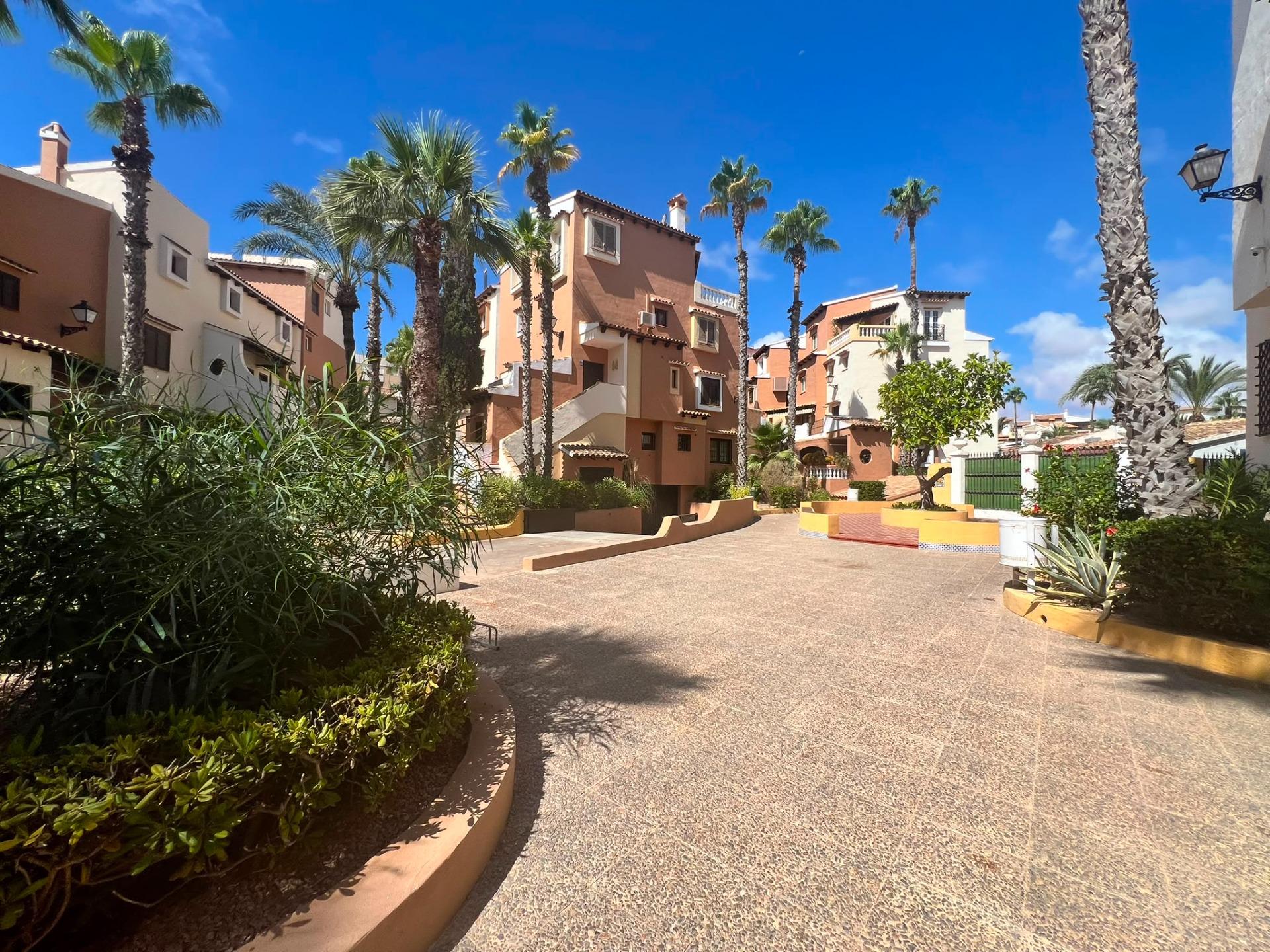 Communal pool with surrounding paved area, Aldea del Mar complex, Torrevieja