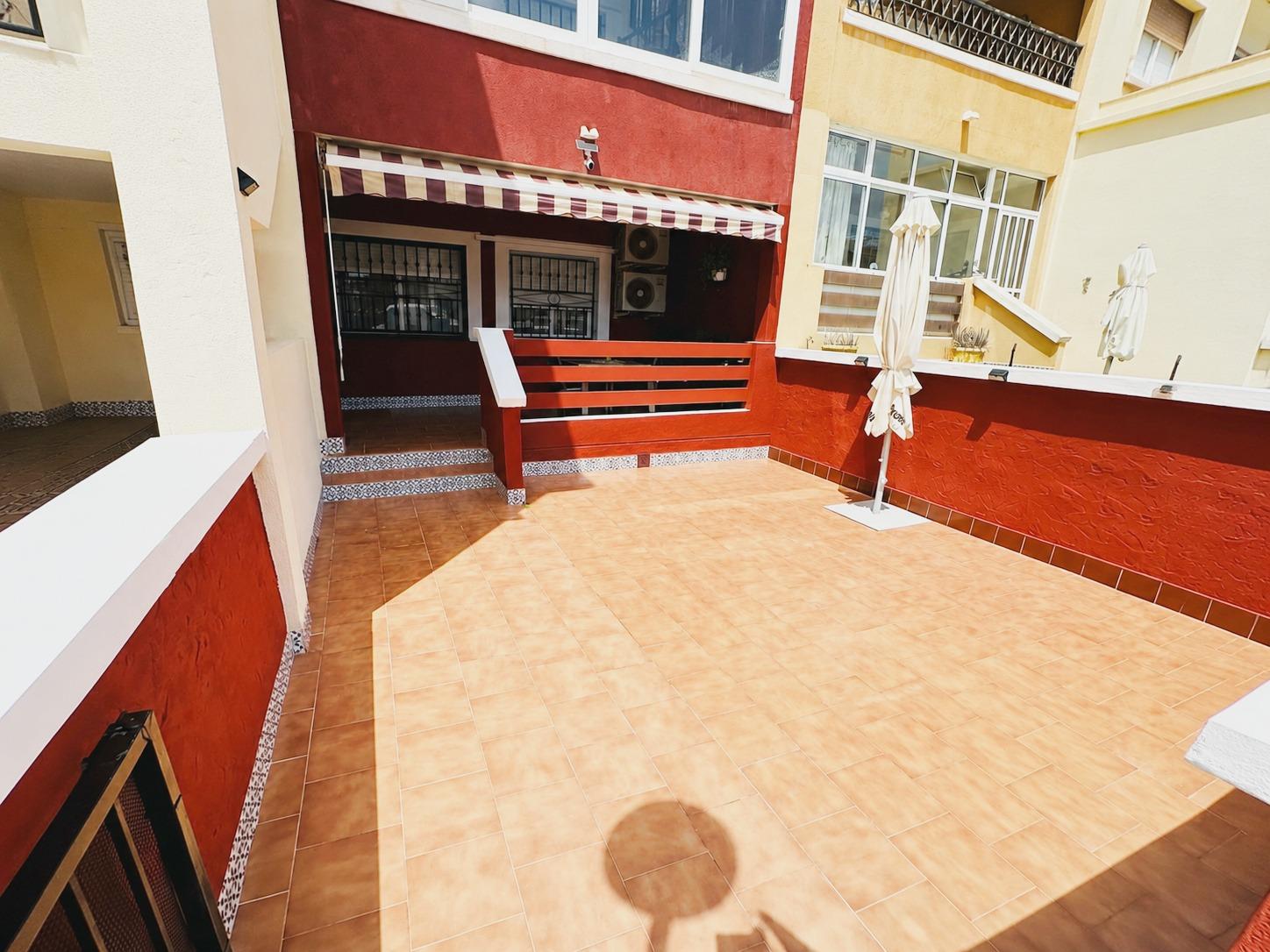 Living and dining area with air conditioning in 2-bedroom bungalow, Los Altos, Orihuela Costa