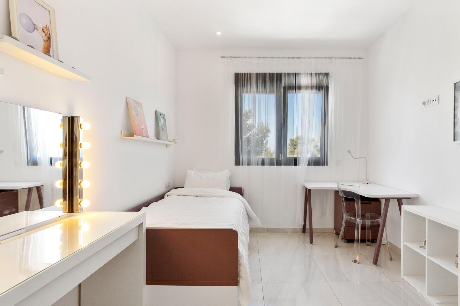 Bedroom with window overlooking garden, villa, Villamartin