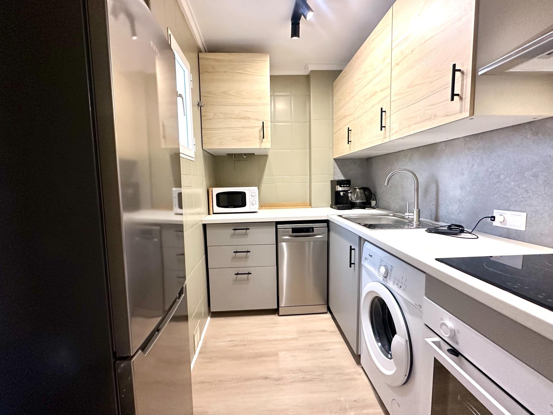 Interior corridor and lift doors in apartment building, Playa del Cura, Torrevieja