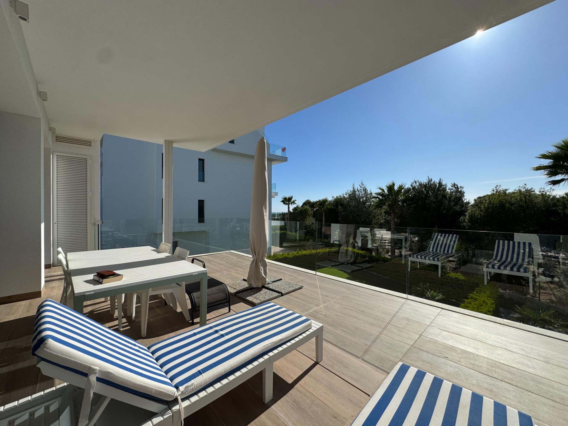 Landscaped communal gardens surrounding the building, Las Colinas Golf