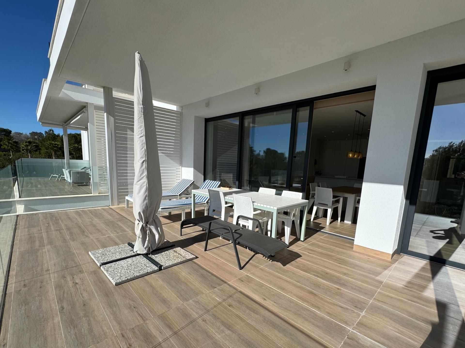 Green space and garden area beside apartment building, Las Colinas Golf