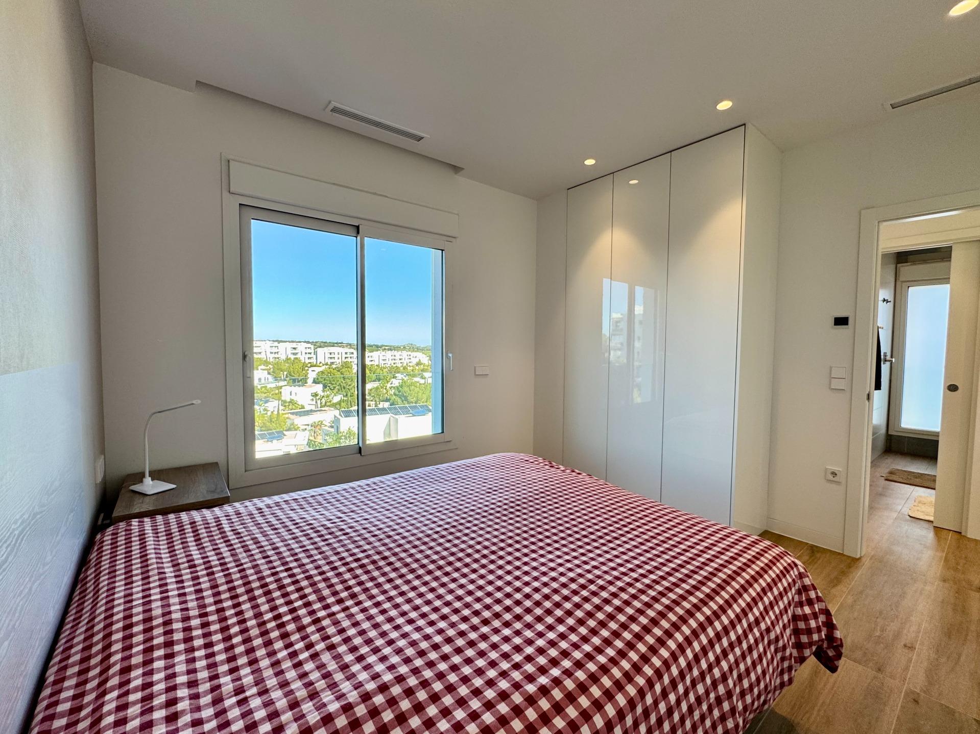 Kitchen island and cabinetry detail, apartment in Las Colinas Golf, Orihuela