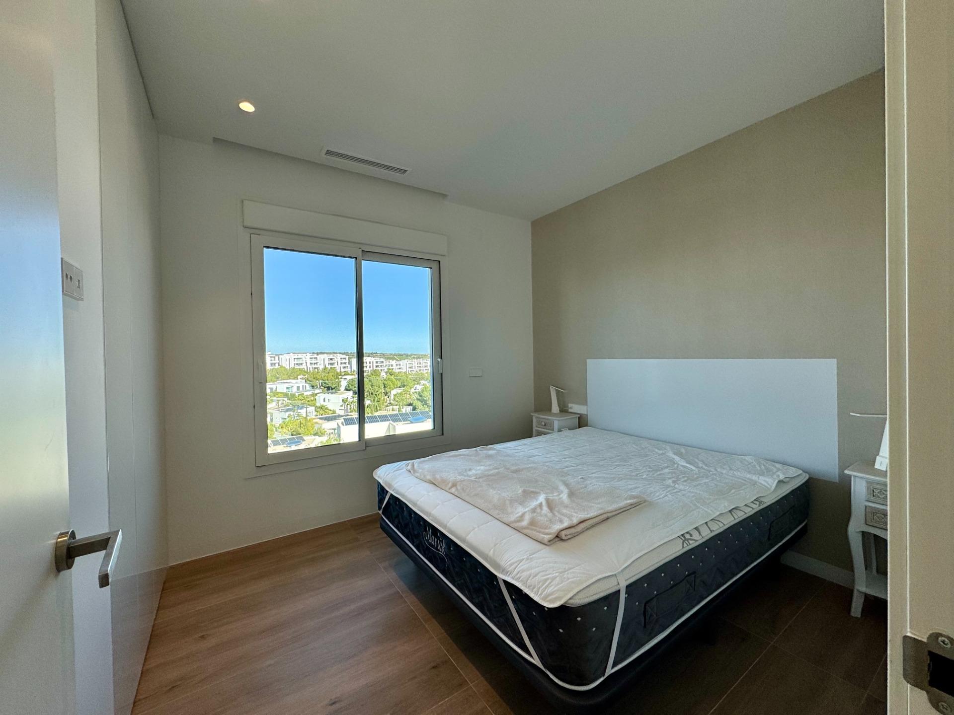 Master bedroom with sliding doors to terrace and built-in wardrobes, Las Colinas Golf