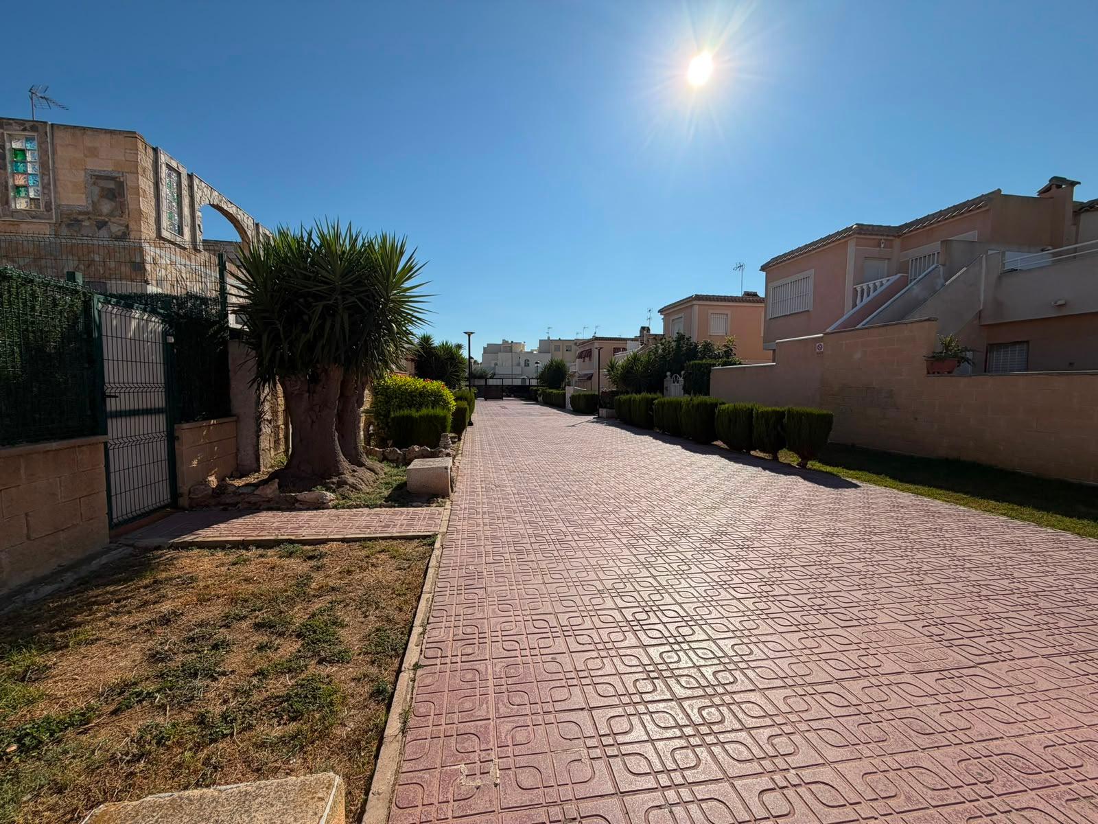 Upper-level solarium with seating space and rooftop views, quad villa, Torrevieja