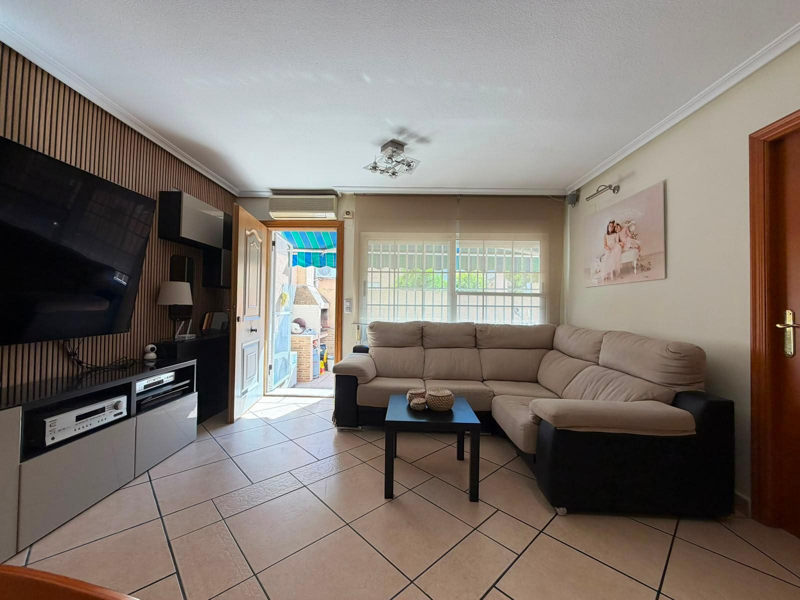 Semi-basement room with desk and shelving used as home office, Carrefour