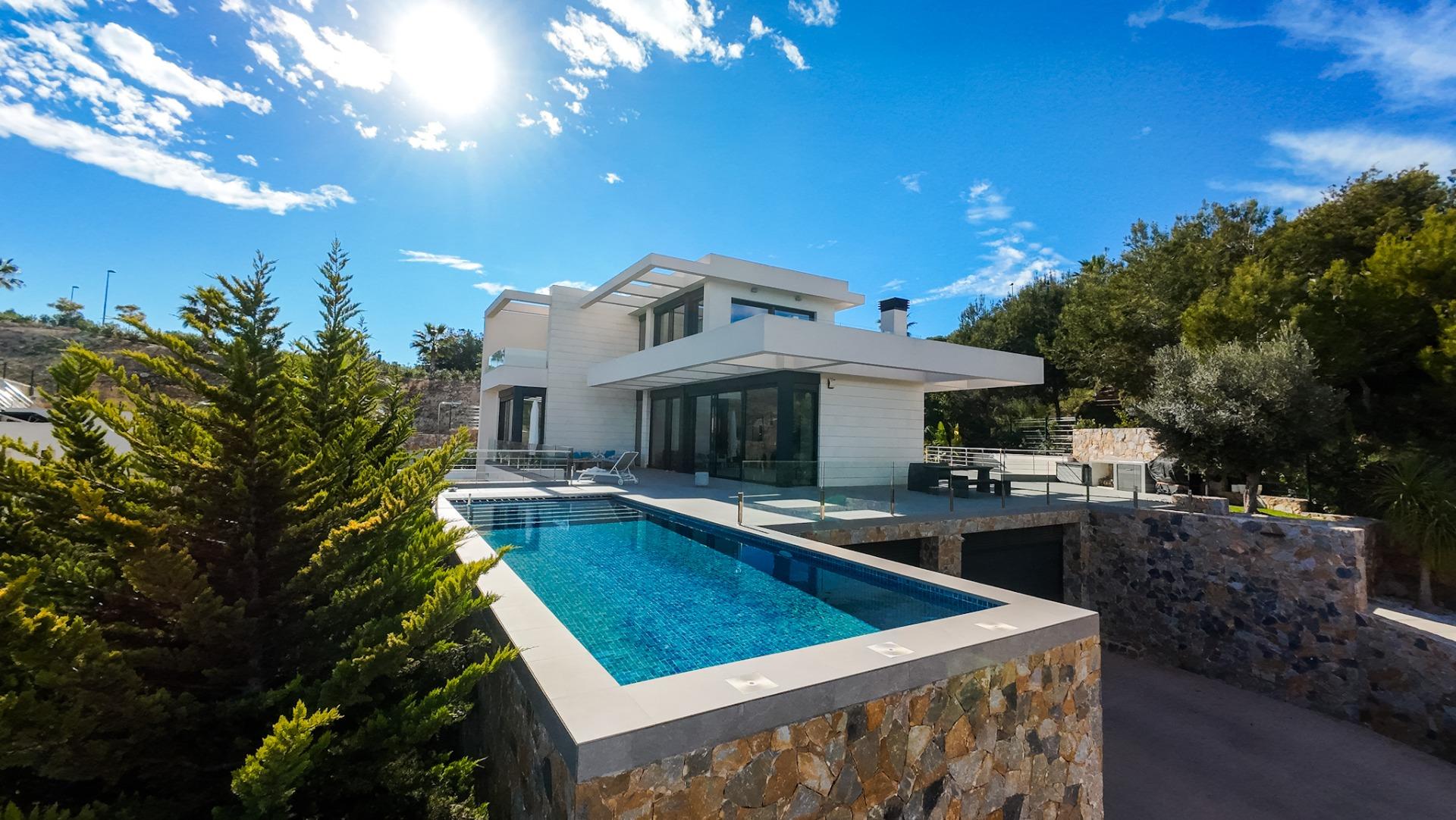 Infinity pool and terrace overlooking the golf fairway, 6-bedroom villa, Las Colinas Golf