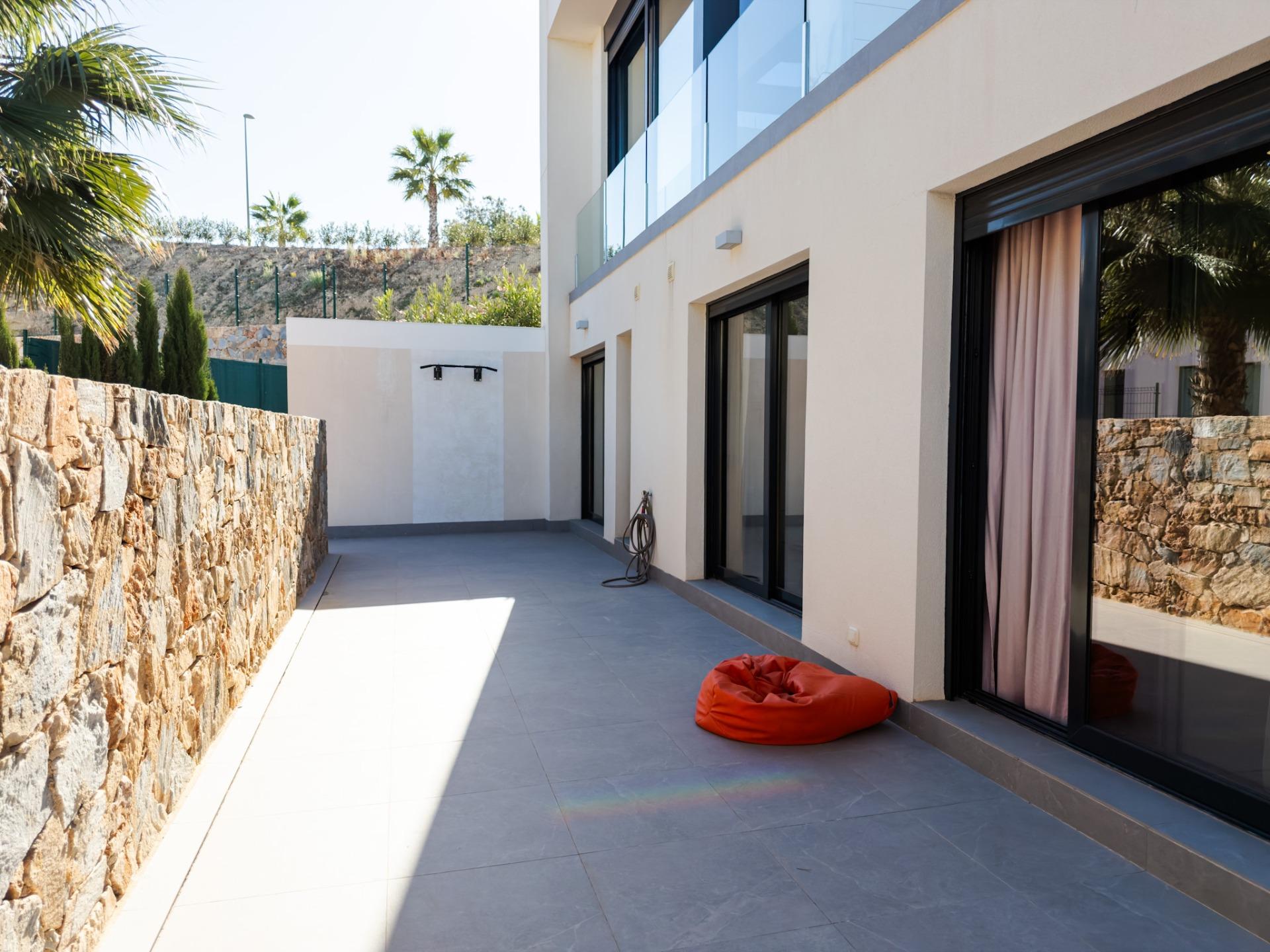 Las Colinas Golf clubhouse viewed from villa plot
