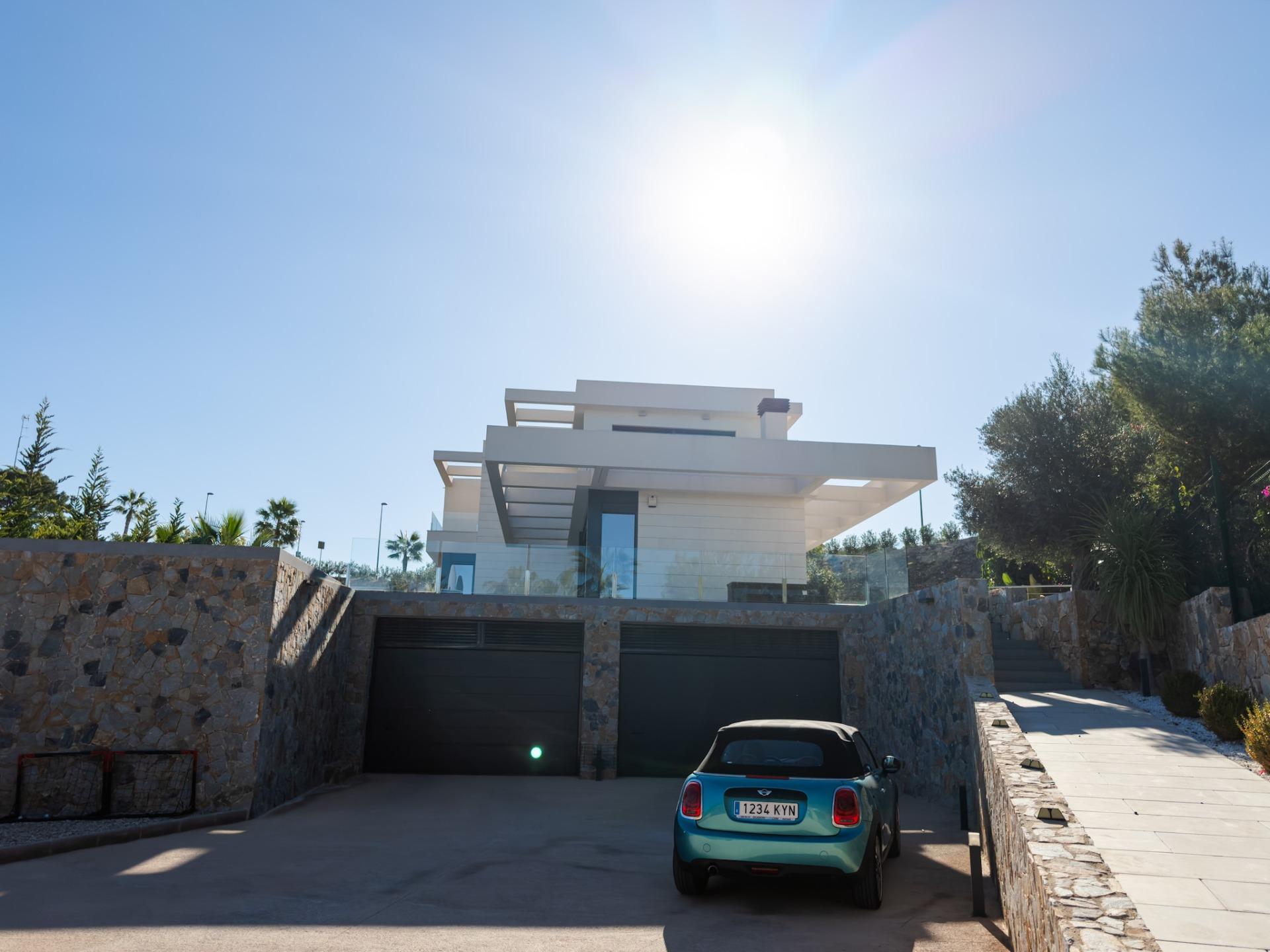 Plot boundary with screening planting, 6-bedroom villa, Las Colinas Golf