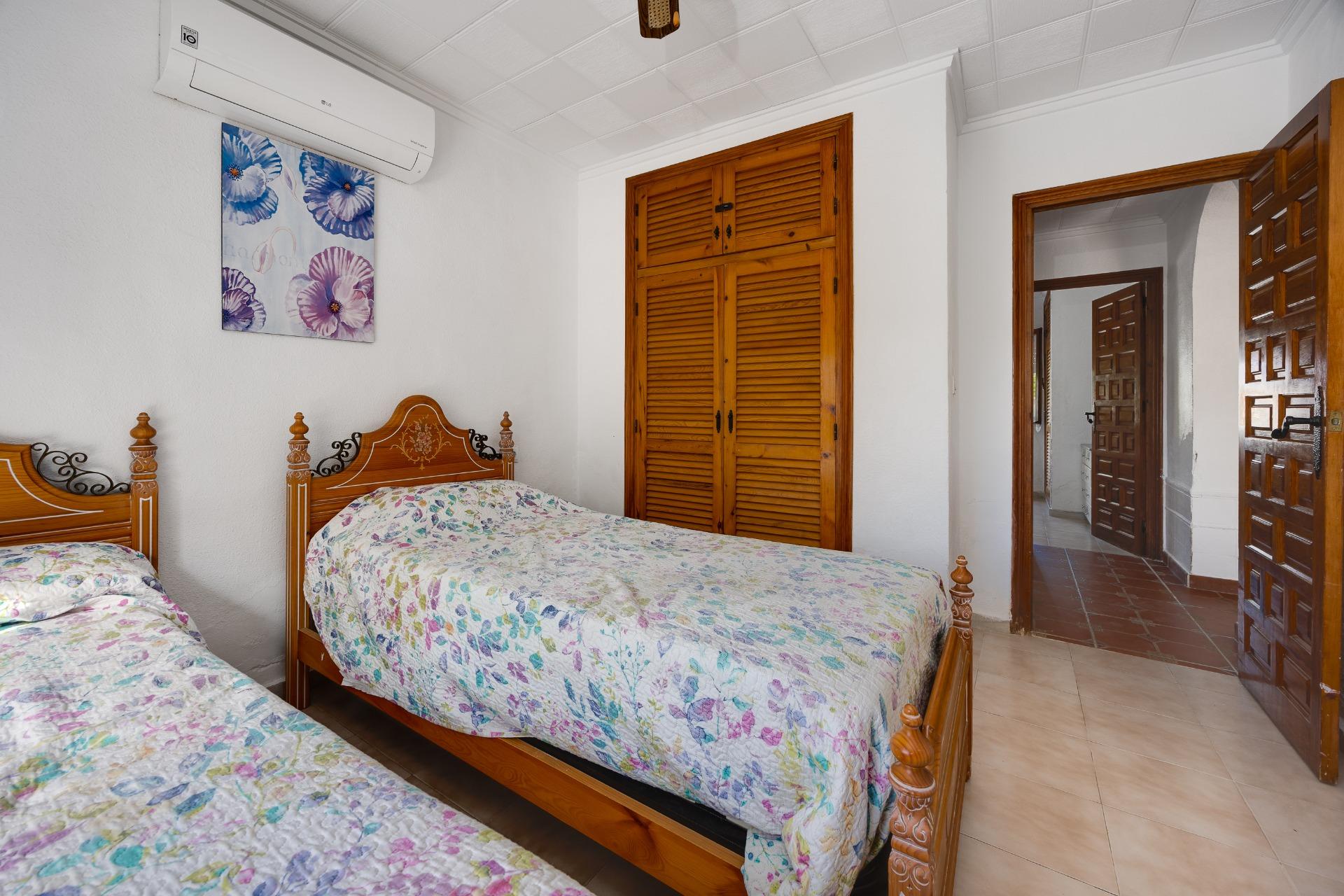 Mature trees within enclosed garden of 796m2 plot, La Siesta, Torrevieja