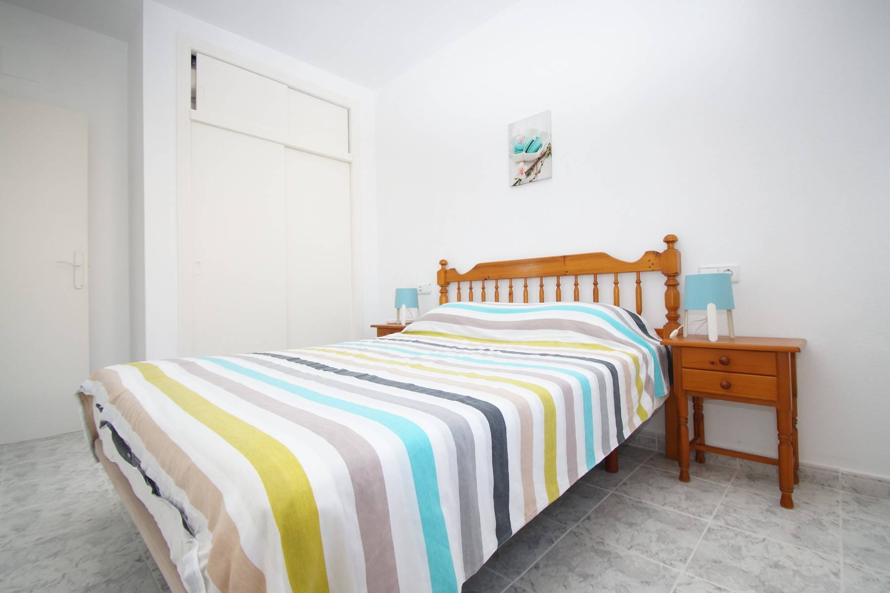 South-facing private roof terrace accessed via internal stairs, Playa Flamenca bungalow
