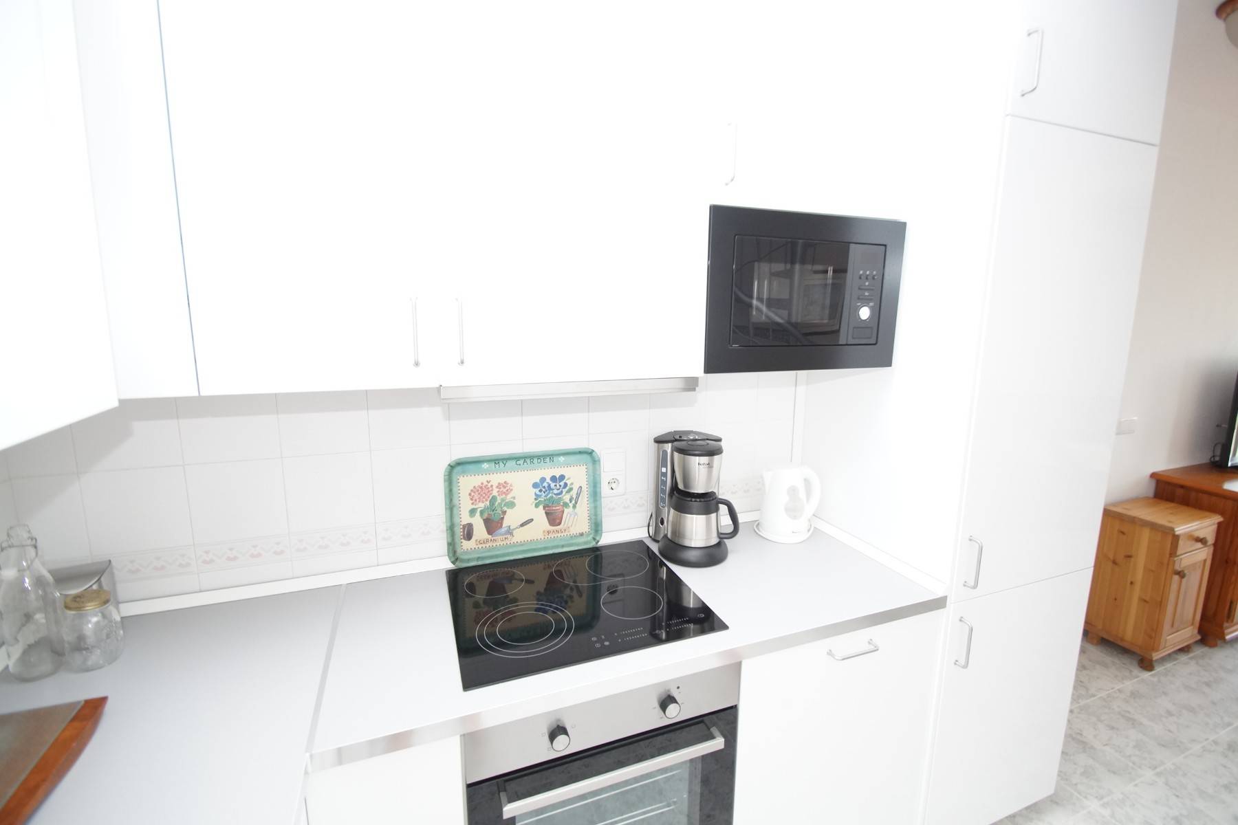 Furnished living room with seating in top-floor bungalow, Playa Flamenca