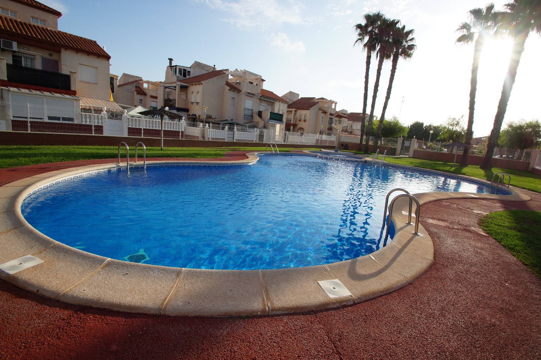 Street-level view of bungalow complex exterior, Playa Flamenca, Orihuela Costa
