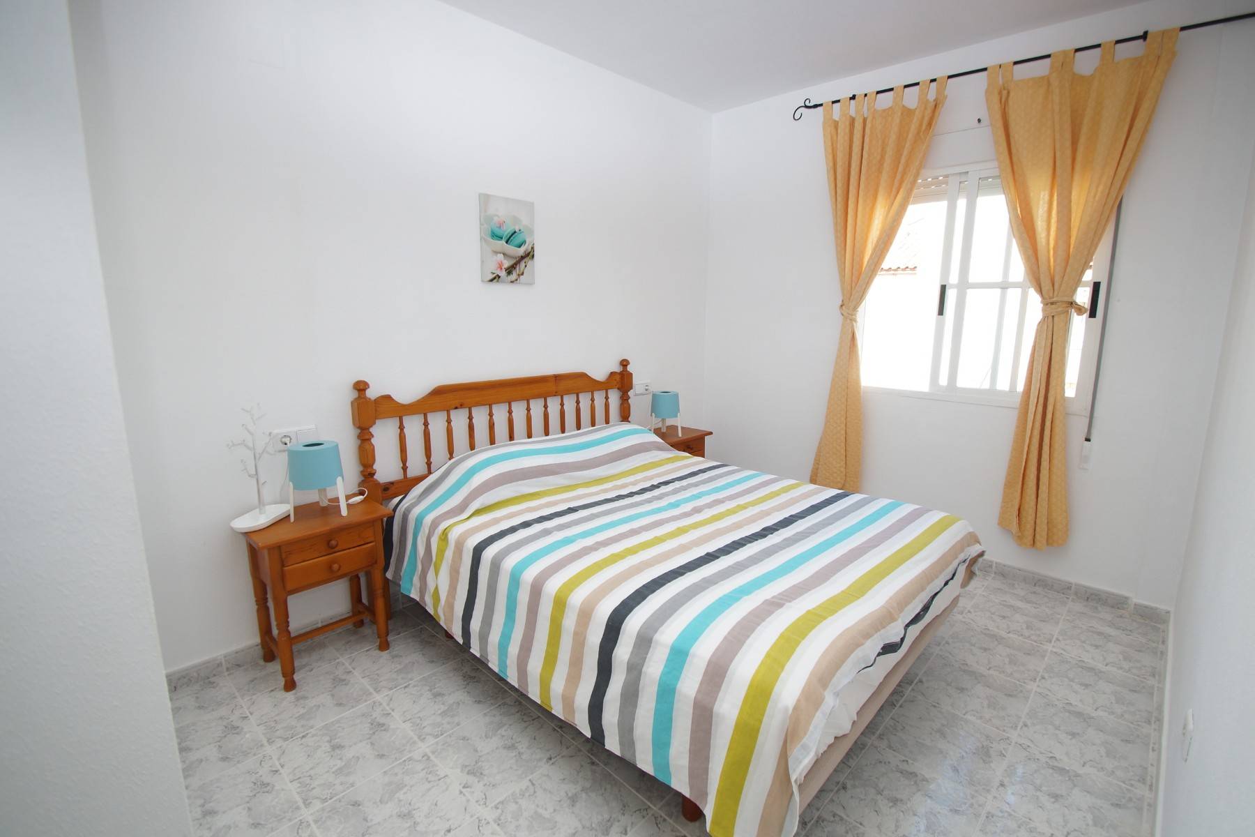Open-plan kitchen and living area in top-floor bungalow, Playa Flamenca