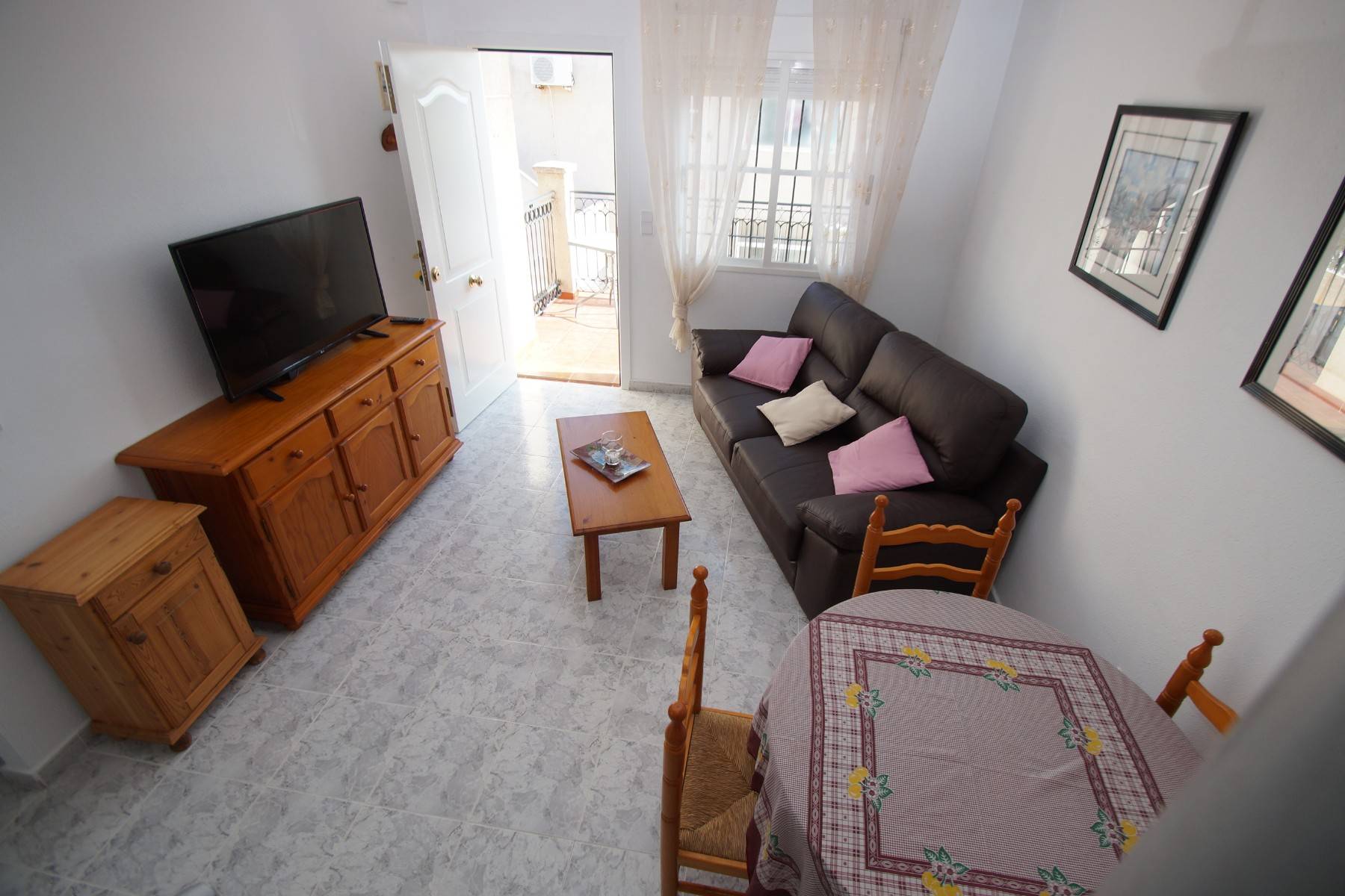 Internal staircase leading to private roof terrace in top-floor bungalow, Playa Flamenca