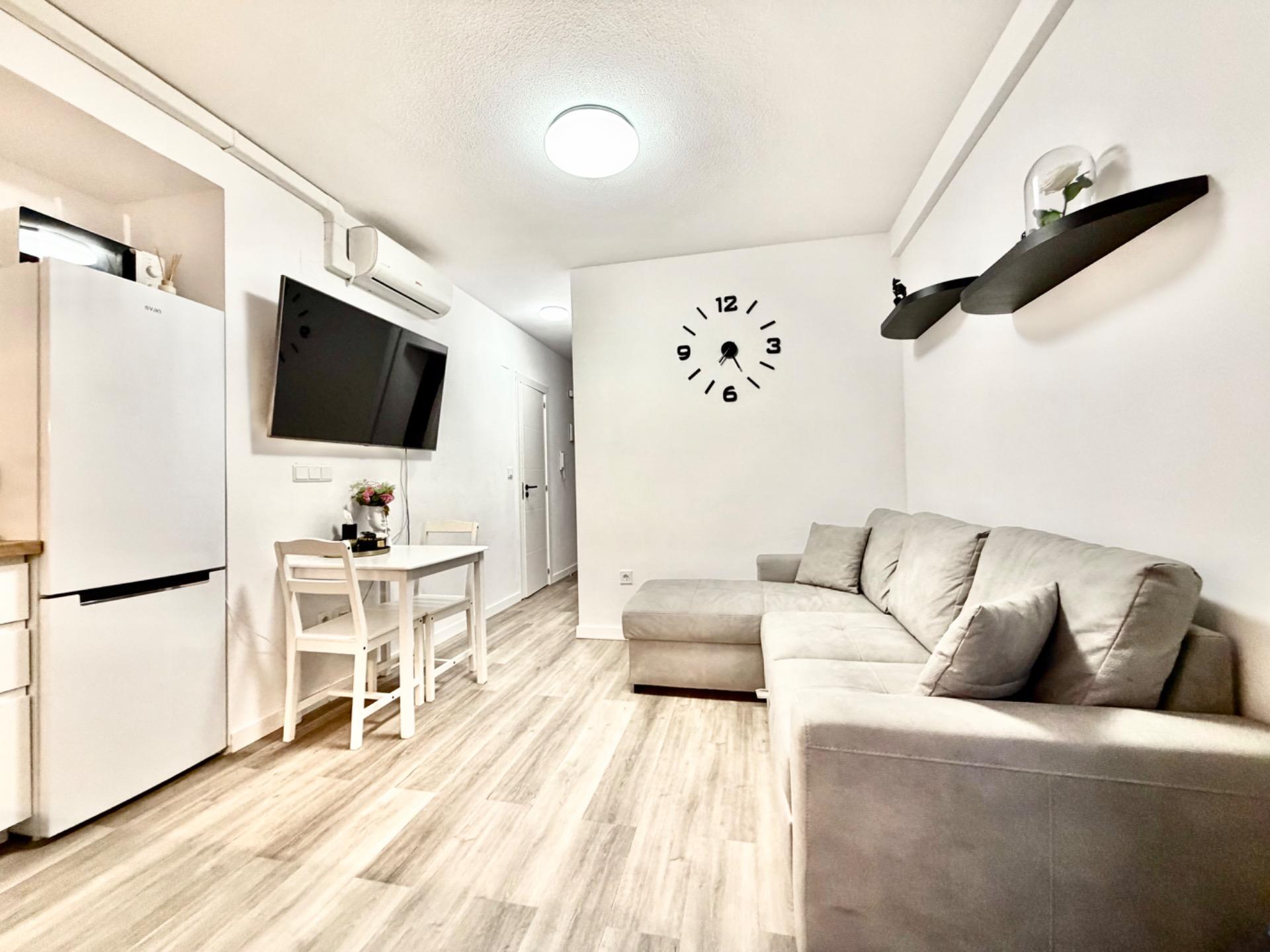 Living area in 1-bedroom apartment, La Mata Pueblo, Torrevieja, showing renovated interior