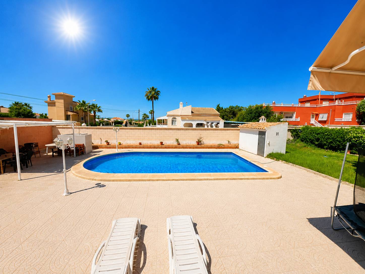 Pool surround and outdoor seating area, detached villa in La Siesta