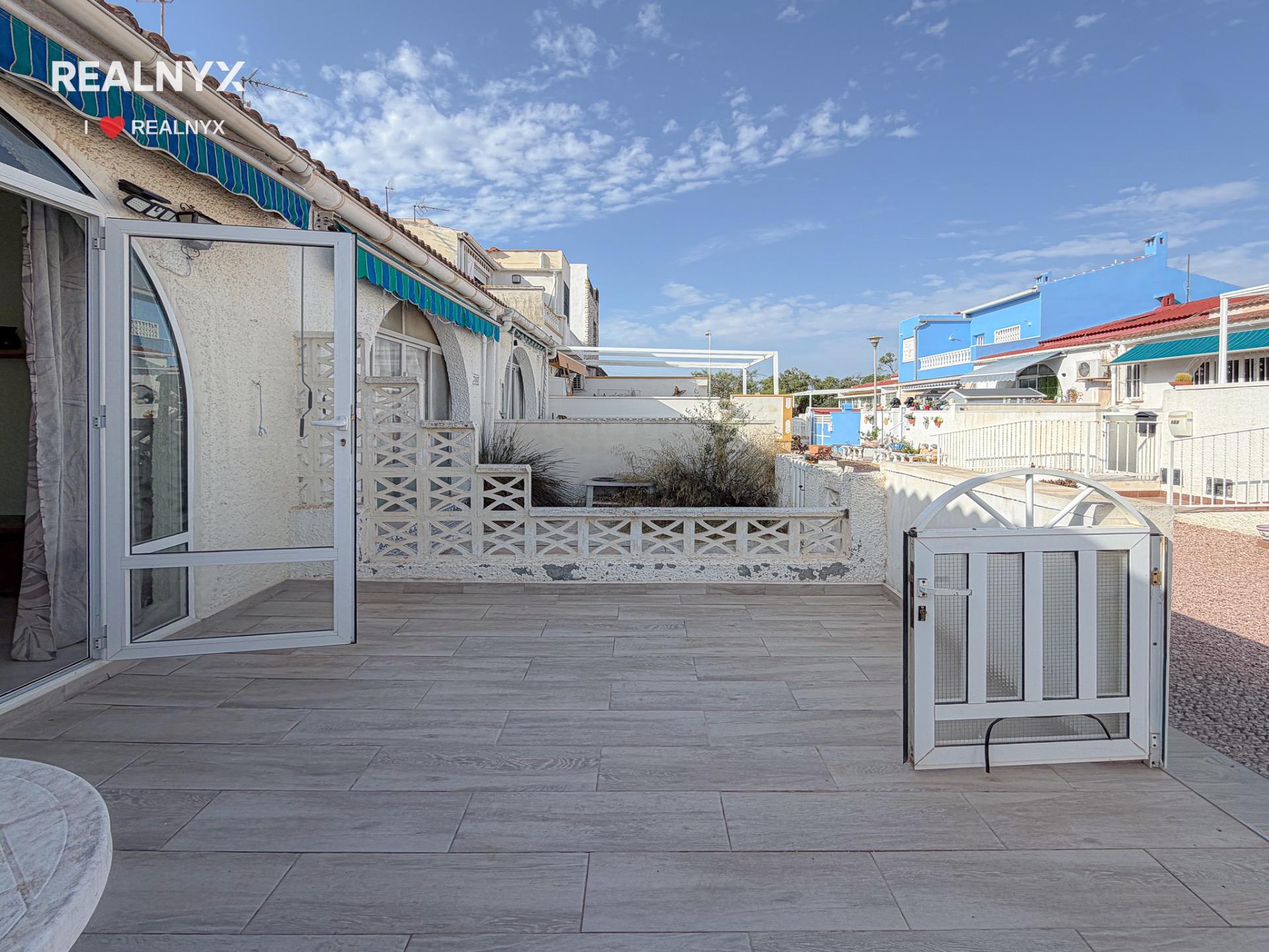 Street-level approach to bungalow in La Siesta, Torrevieja