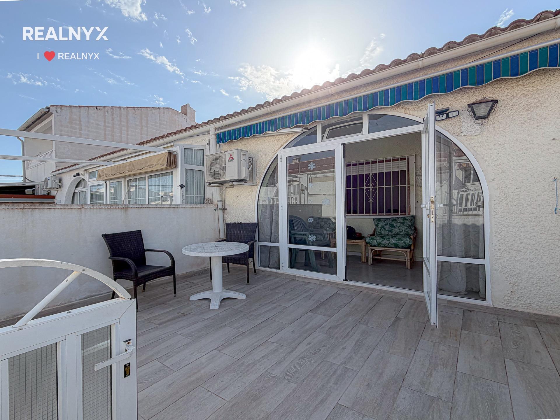 Terrace area of 1-bedroom bungalow in La Siesta, Torrevieja