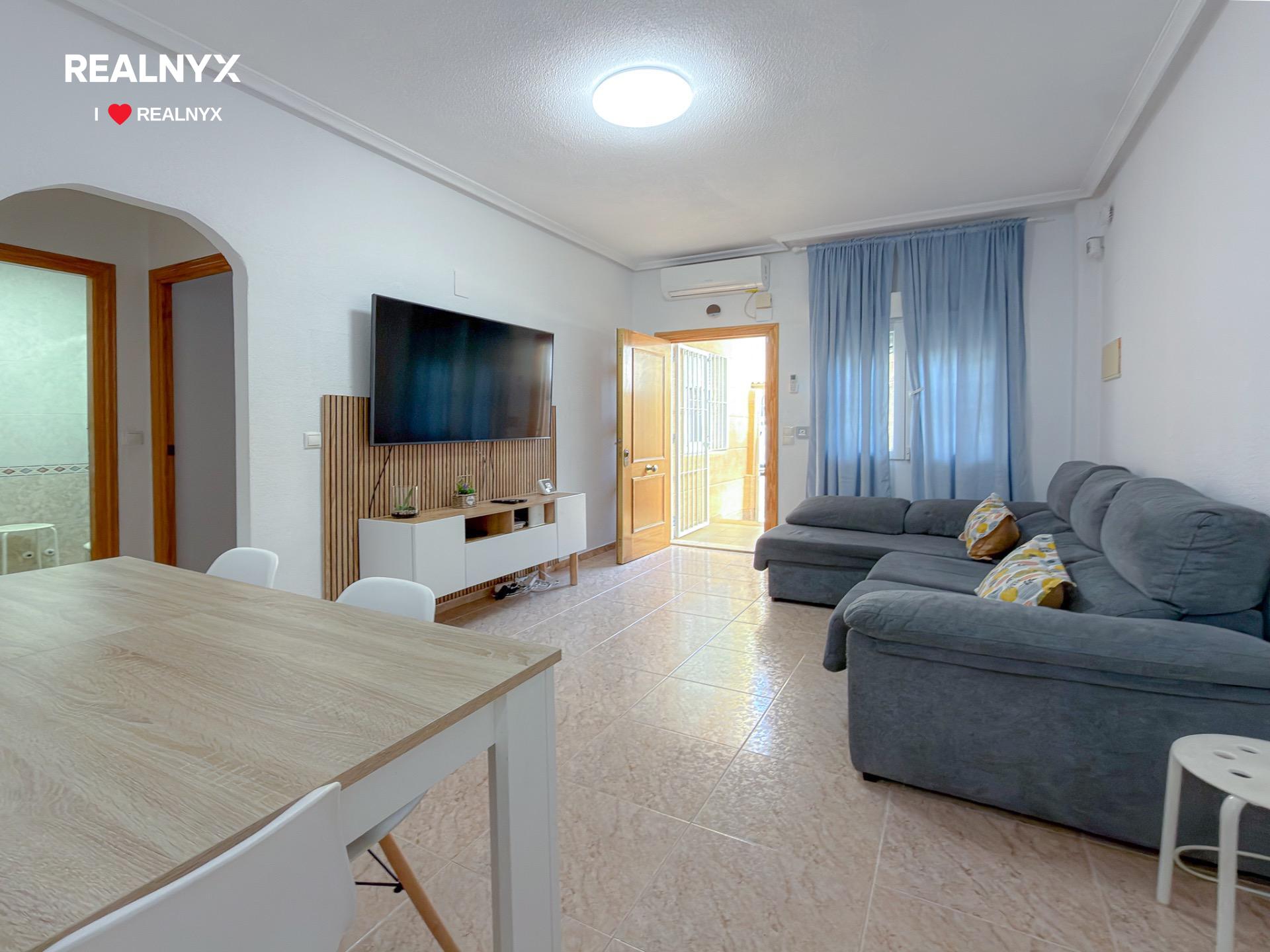 Pool area with surrounding gardens, Nueva Torrevieja urbanisation