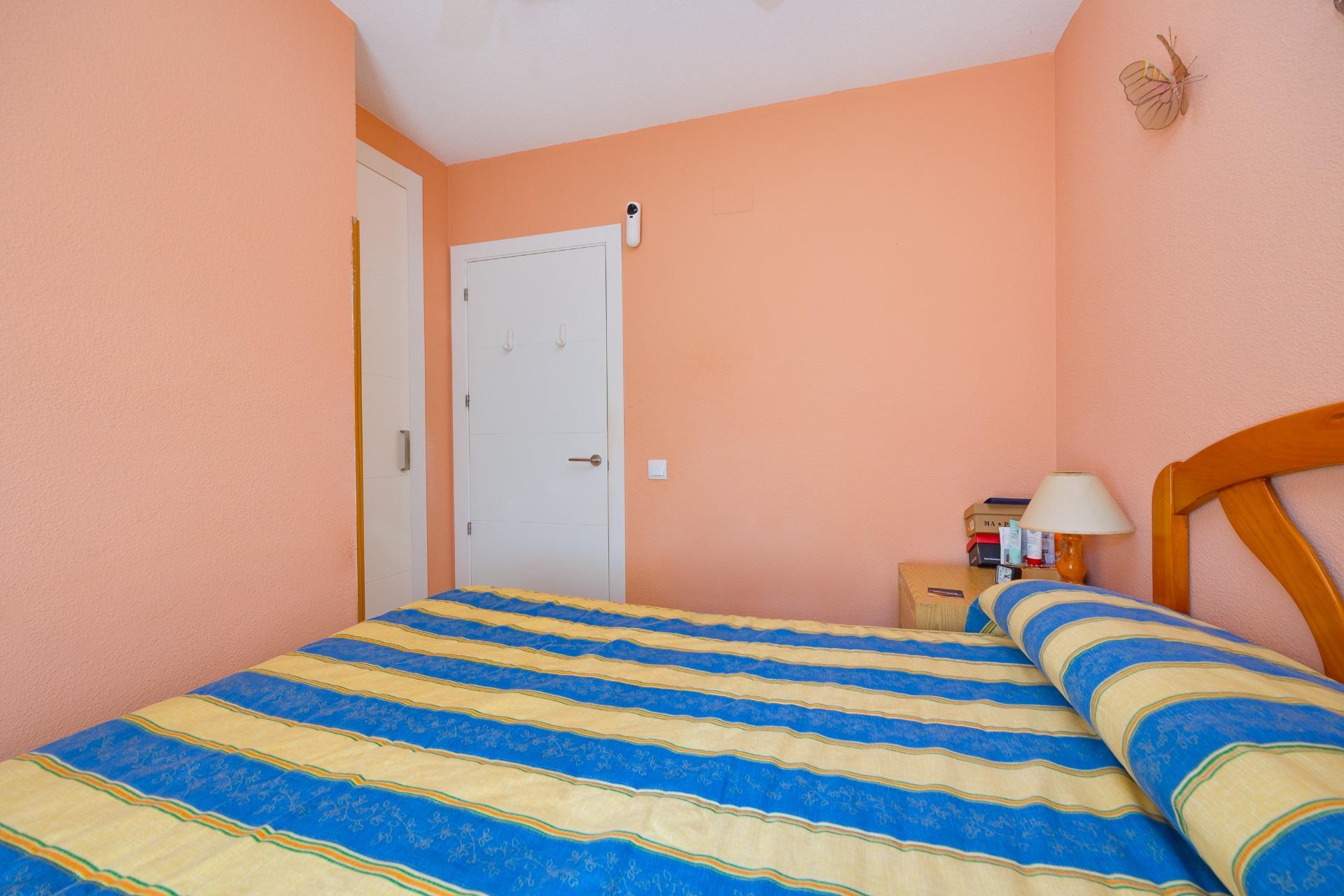 Bedroom interior with window, townhouse in Los Altos, Torrevieja