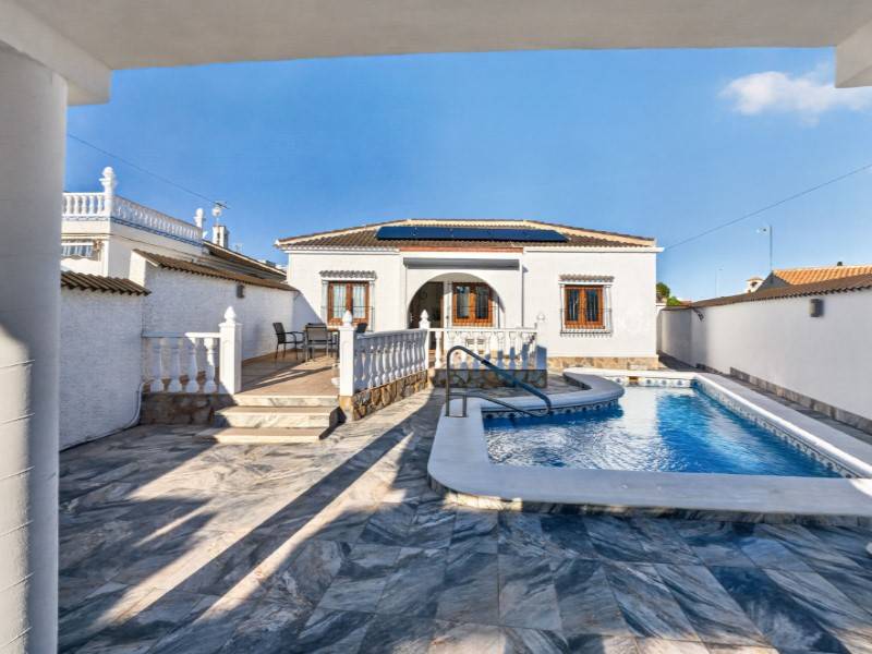 Private swimming pool and patio area at 3-bedroom villa, La Siesta, Torrevieja