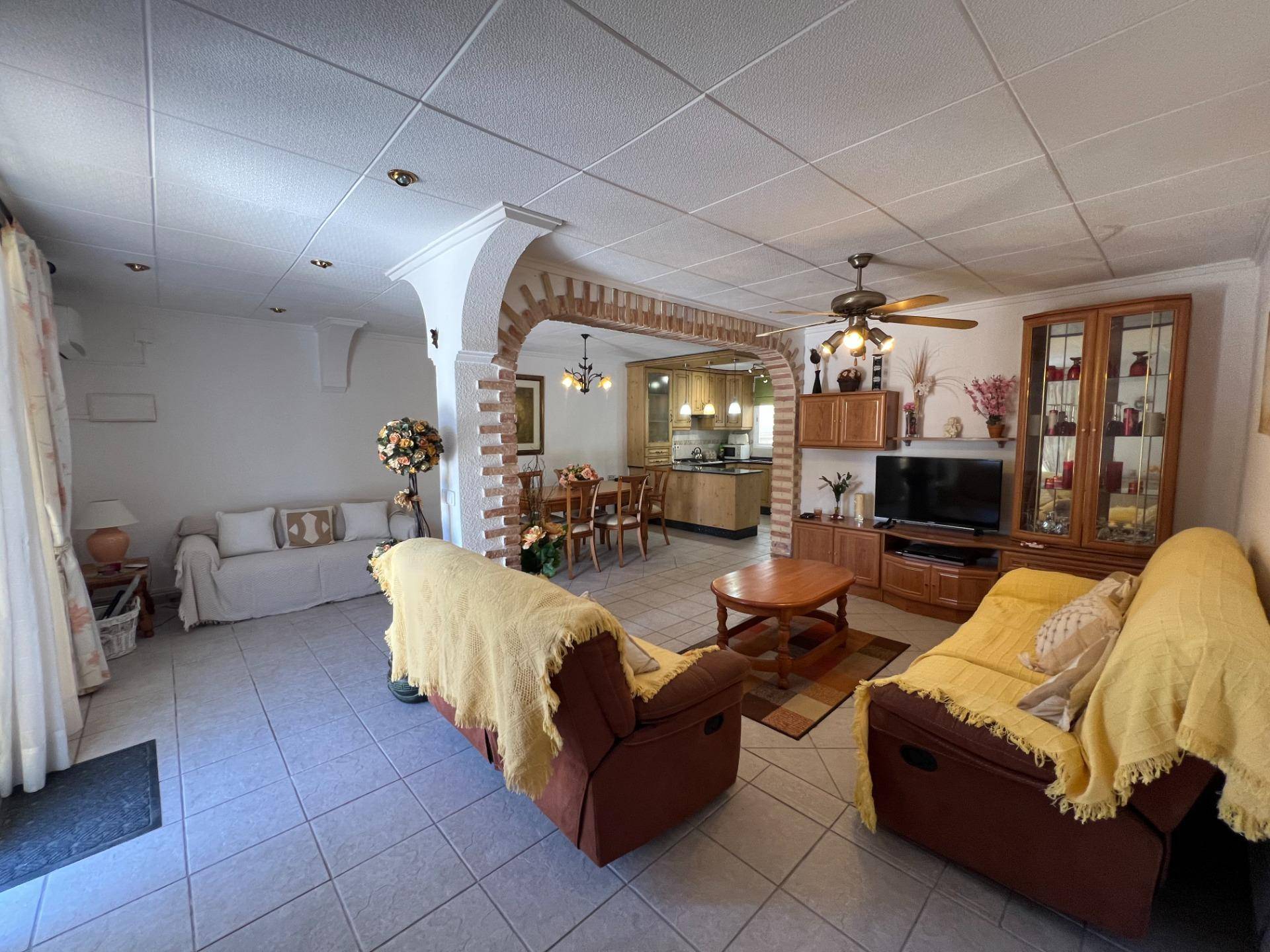 Villa for sale in San Luis, Torrevieja - exterior view with front patio and awning