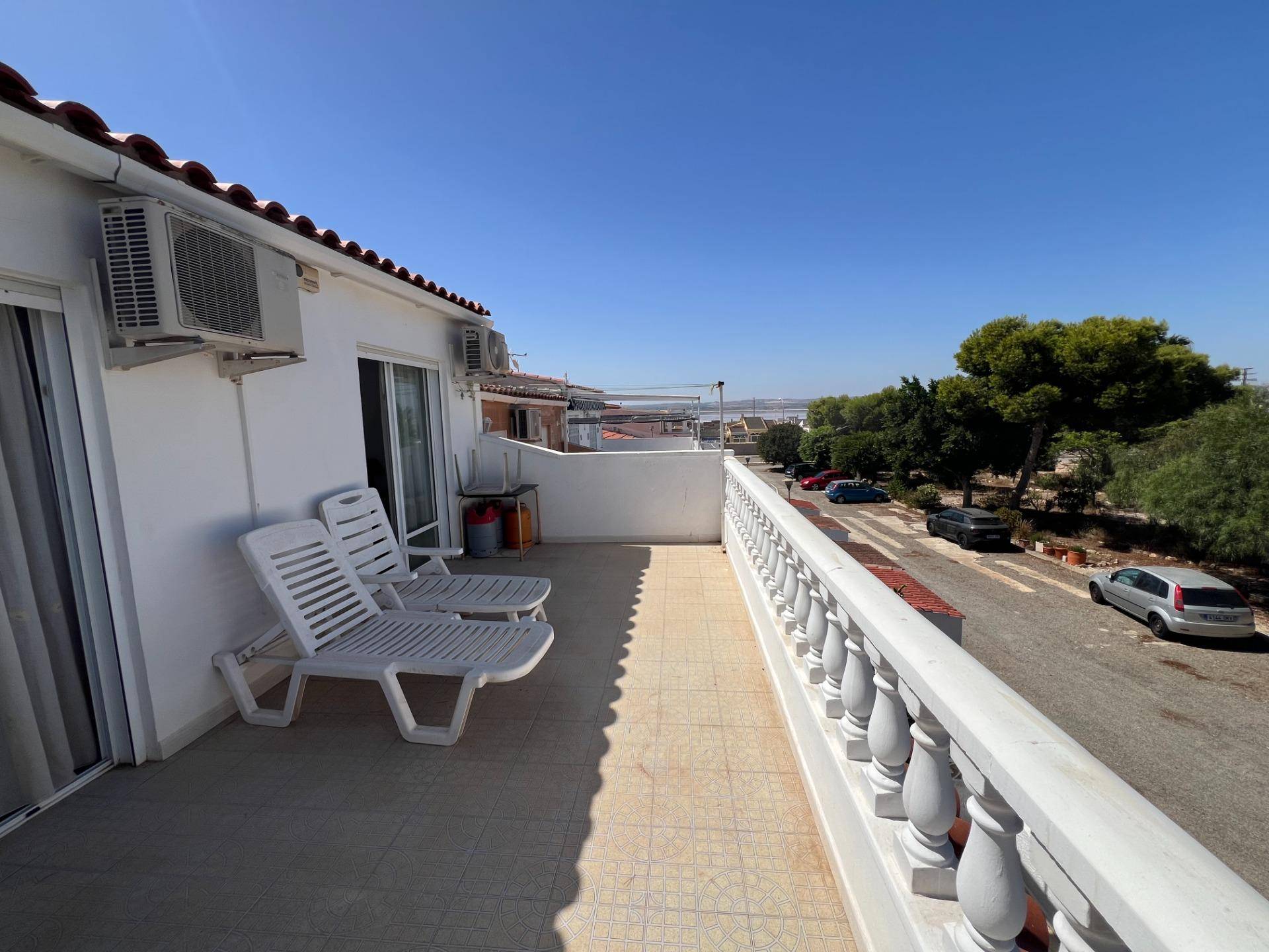Balcony with views over gardens and salt lake, San Luis, Torrevieja