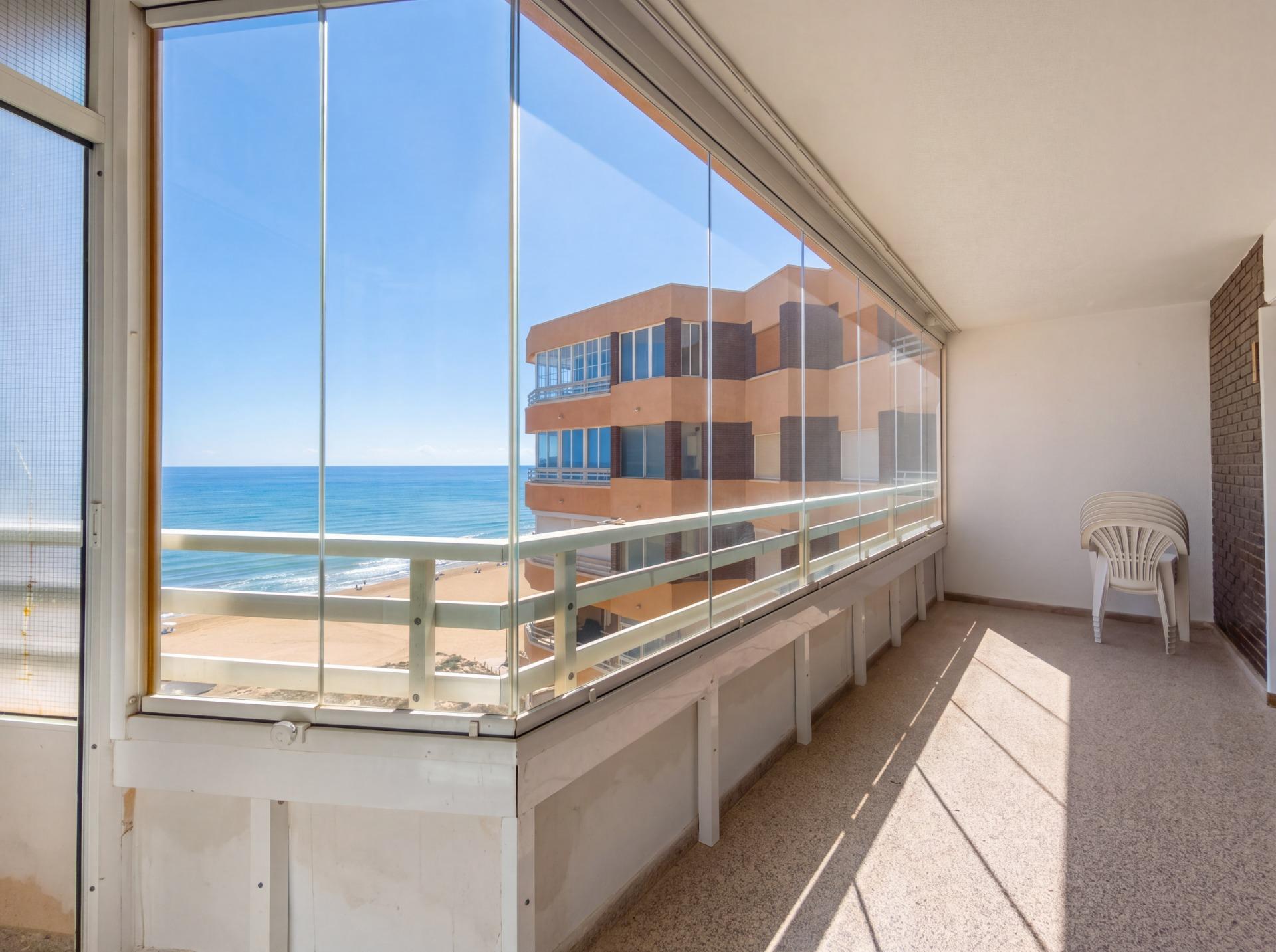 Apartment for sale in La Mata Pueblo, Torrevieja - 8th-floor exterior view of gated beachfront building