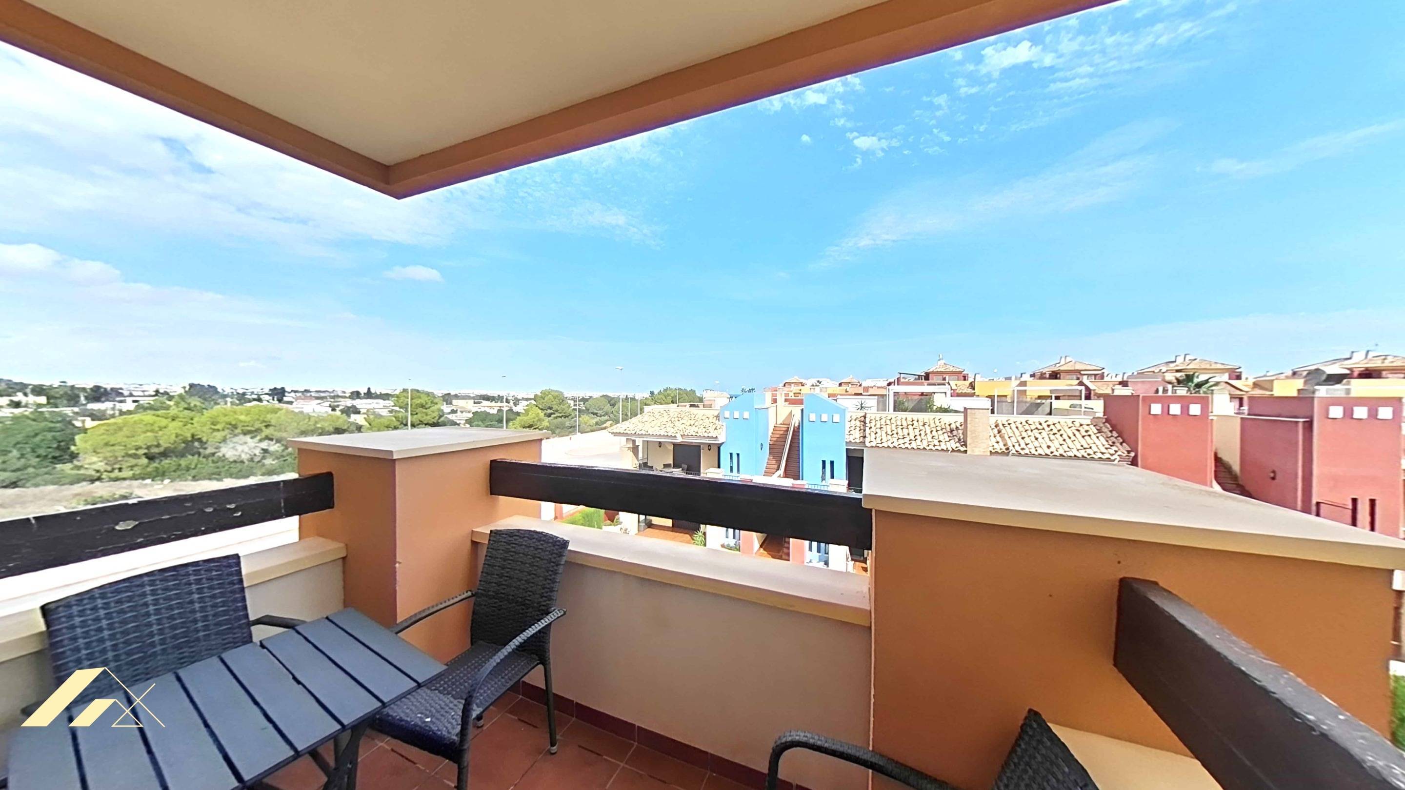Building entrance and landscaped grounds, Lomas de Cabo Roig