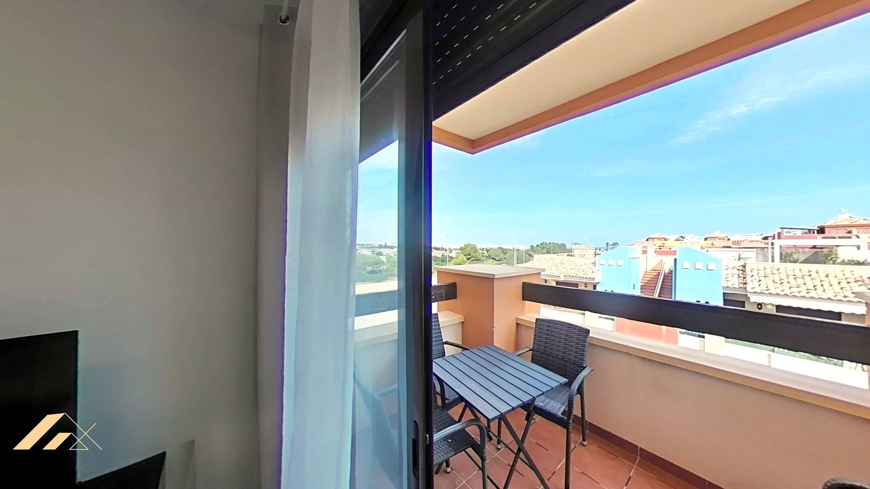 Tree-lined communal area at apartment complex, Lomas de Cabo Roig