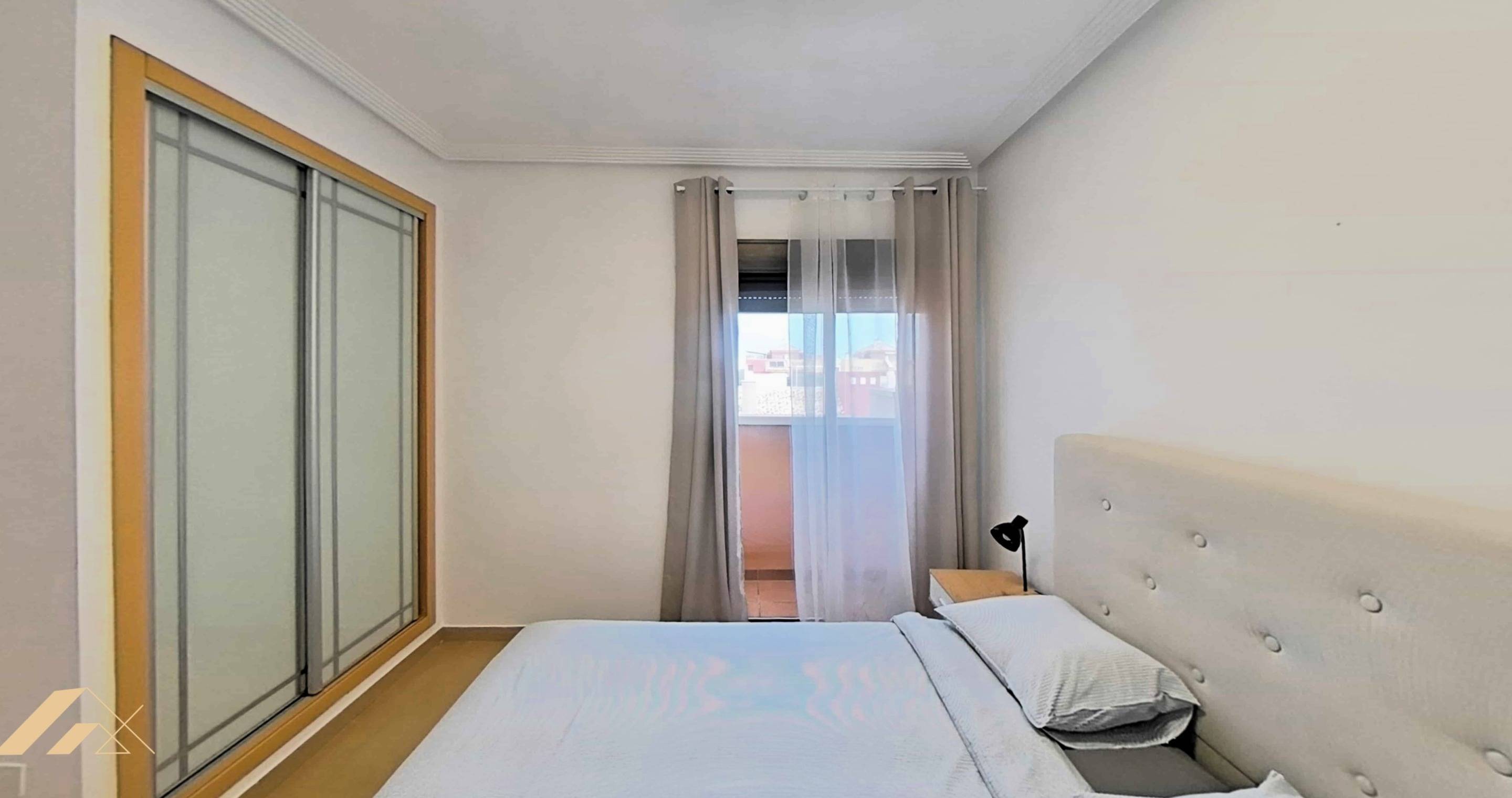 Living room window view, garden-level apartment in Lomas de Cabo Roig