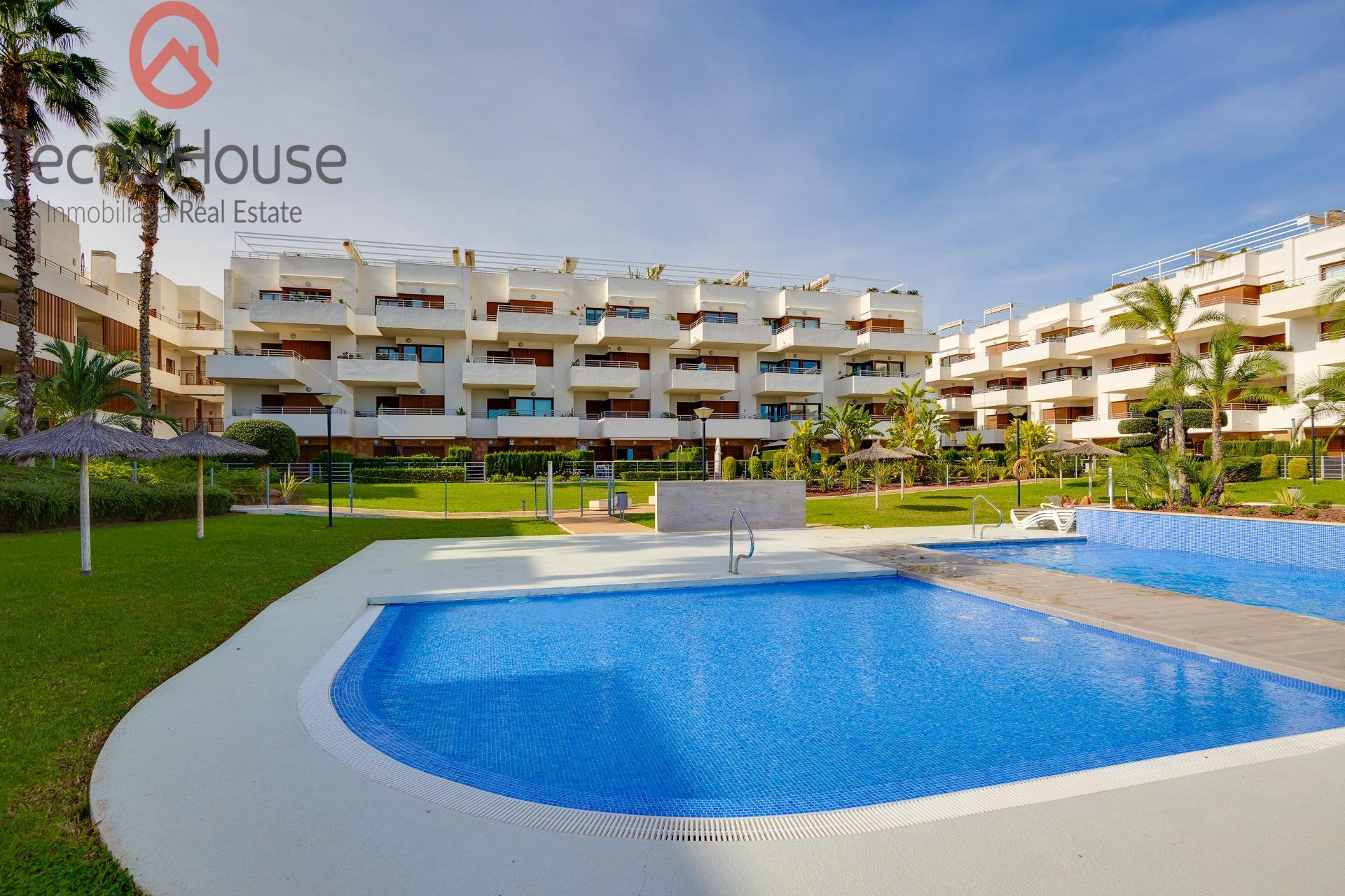 View of neighbouring gardens from terrace, Lomas de Cabo Roig apartment