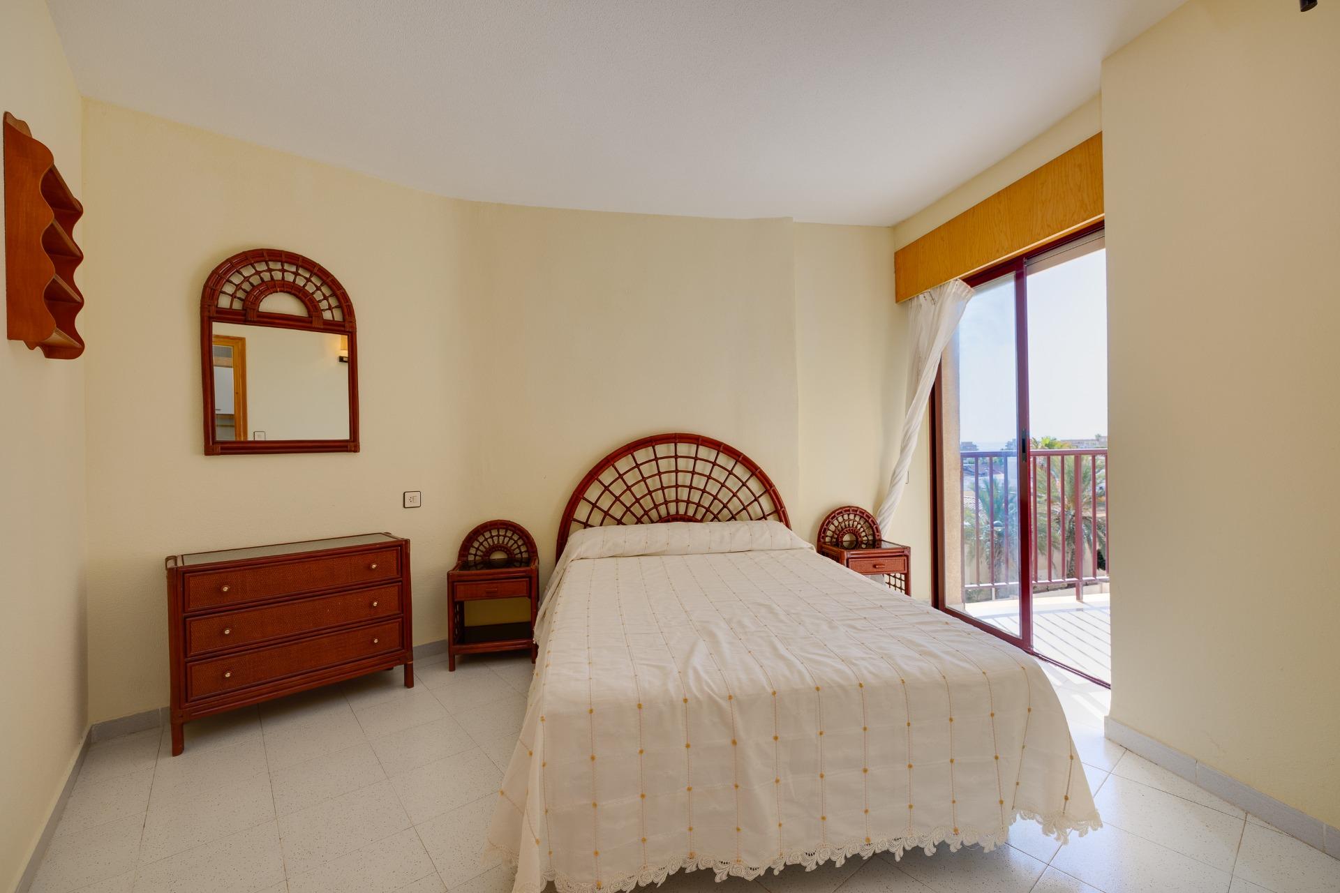 Bedroom detail with built-in wardrobe, La Mata apartment, Torrevieja