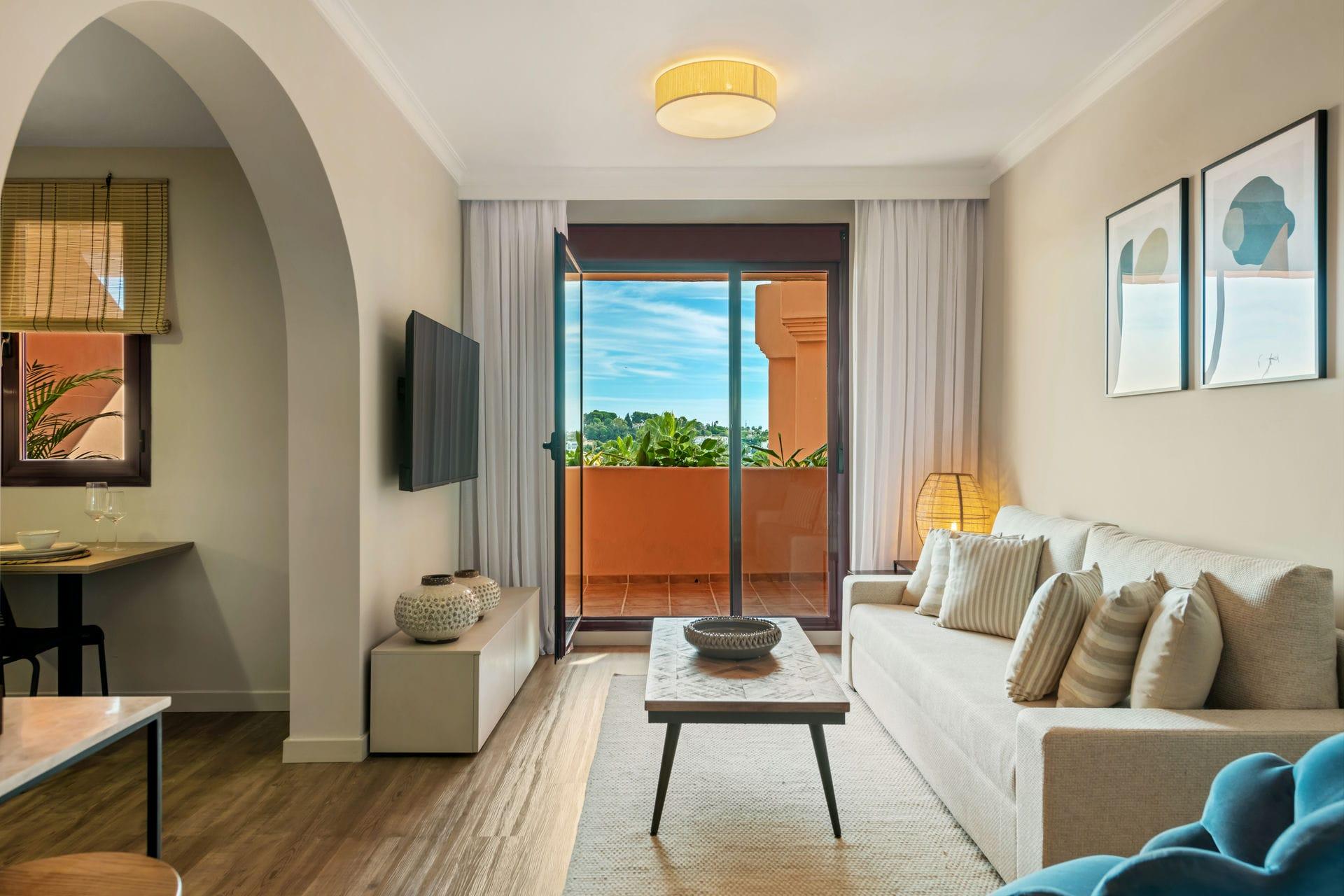 Building facade and main entrance, new-build apartment block, Cortés, Benahavis