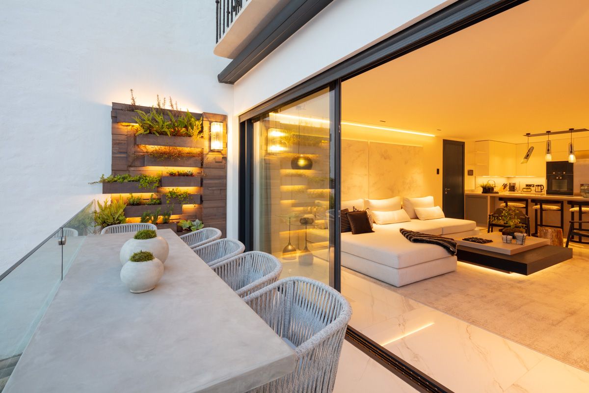 Living room with floor-to-ceiling double-glazed doors in new-build apartment, Puerto, Marbella