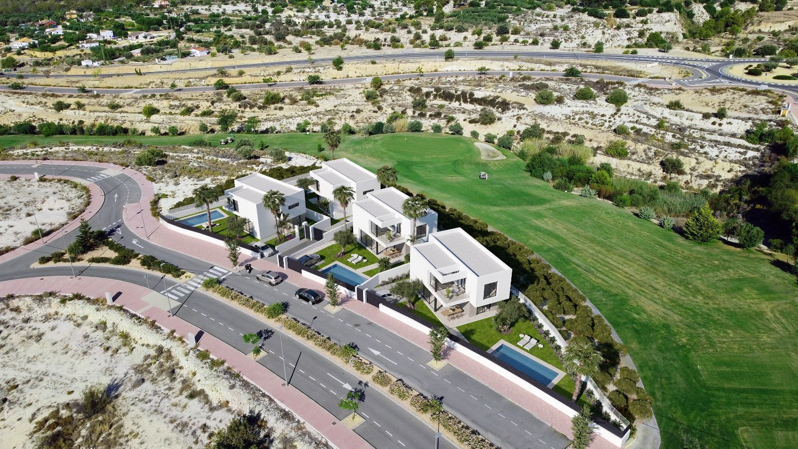 Garden and plot area surrounding new-build villa in Golf Puig Campana, Finestrat